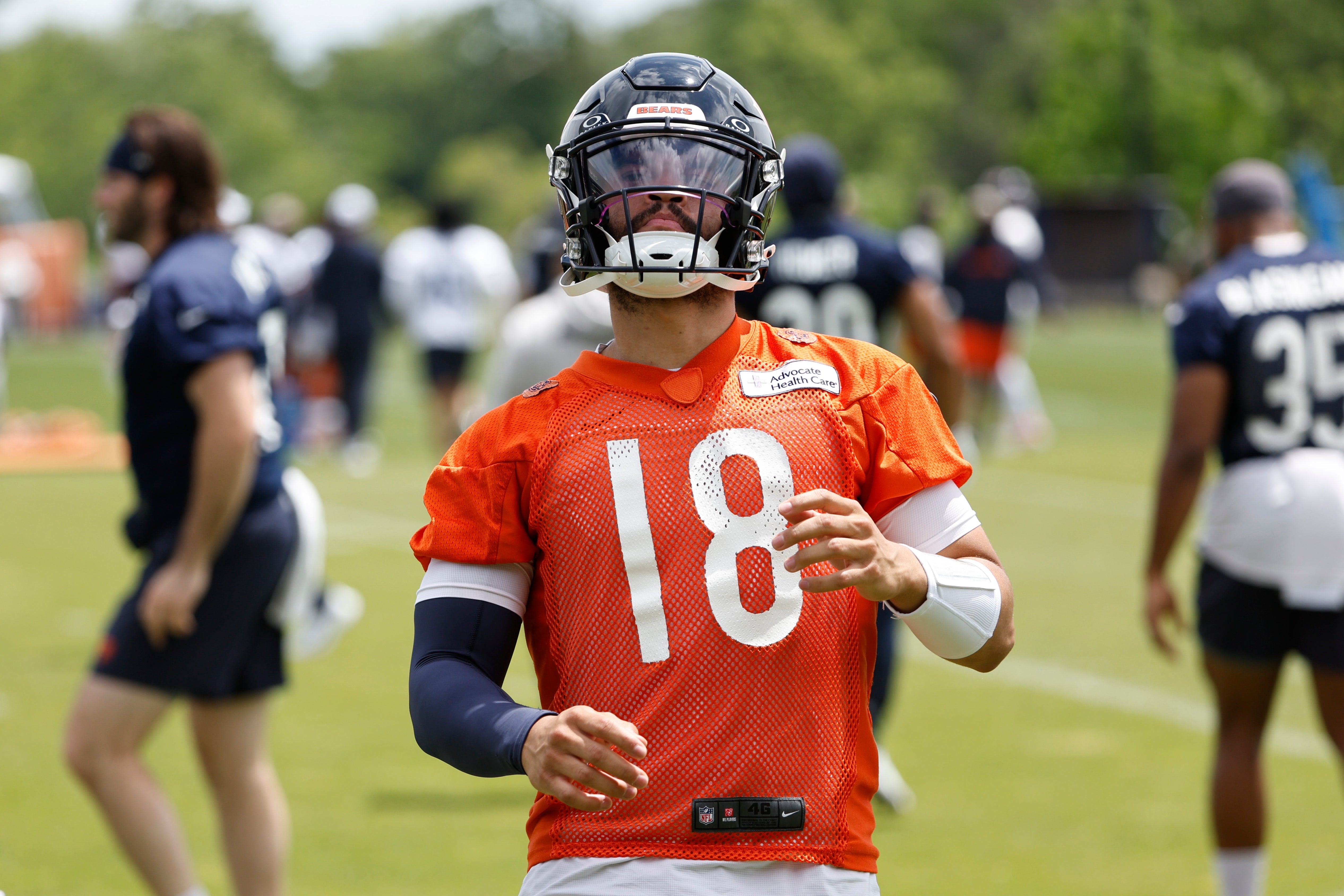 Jun 5, 2024; Lake Forest, IL, USA; Chicago Bears quarterback Caleb Williams (18) warms up during the team's minicamp at Halas Hall.