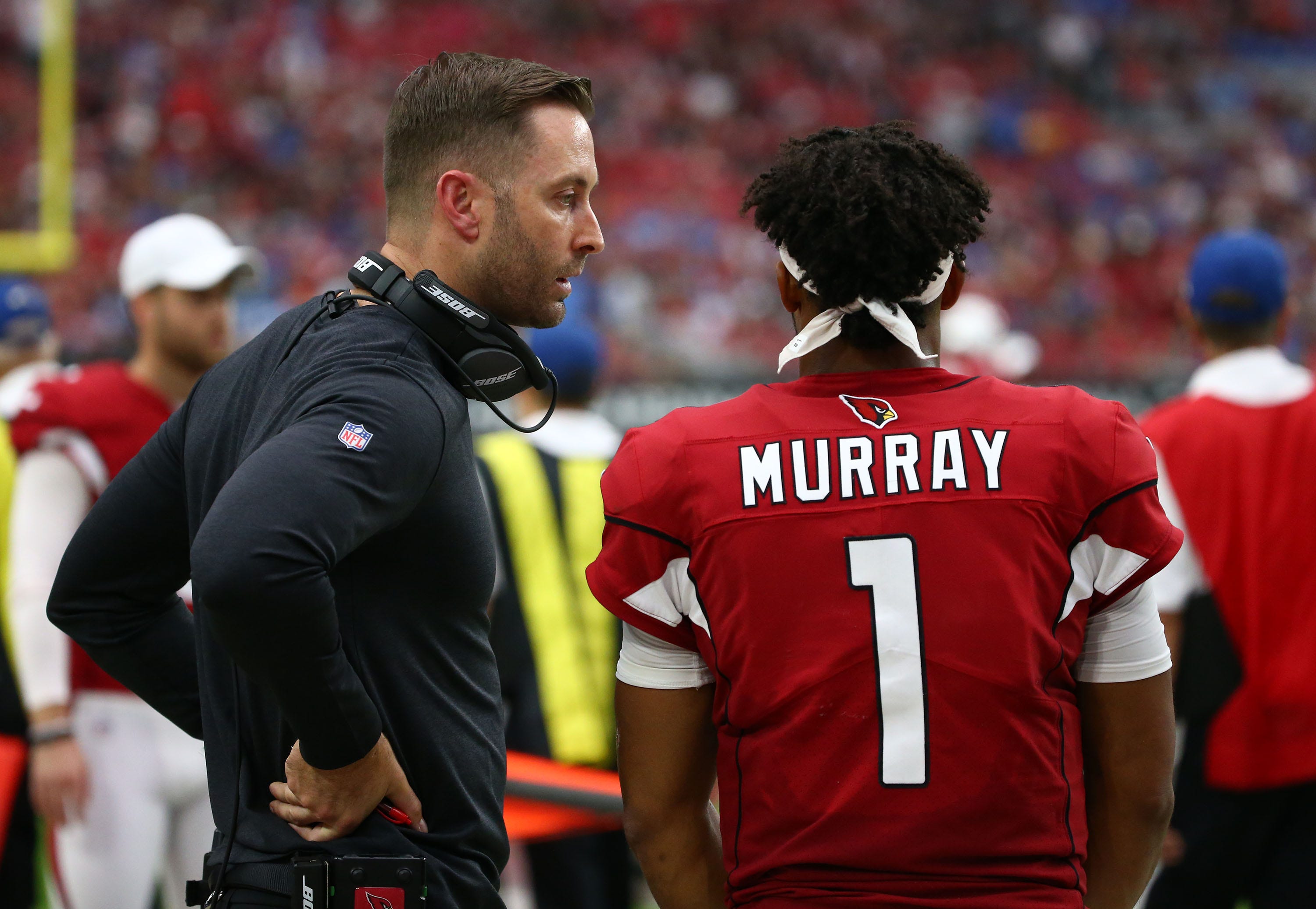 Cardinals head coach Kliff Kingsbury talks to quarterback Kyler Murray (1) during the second half of a game against the Lions on Sept. 8.