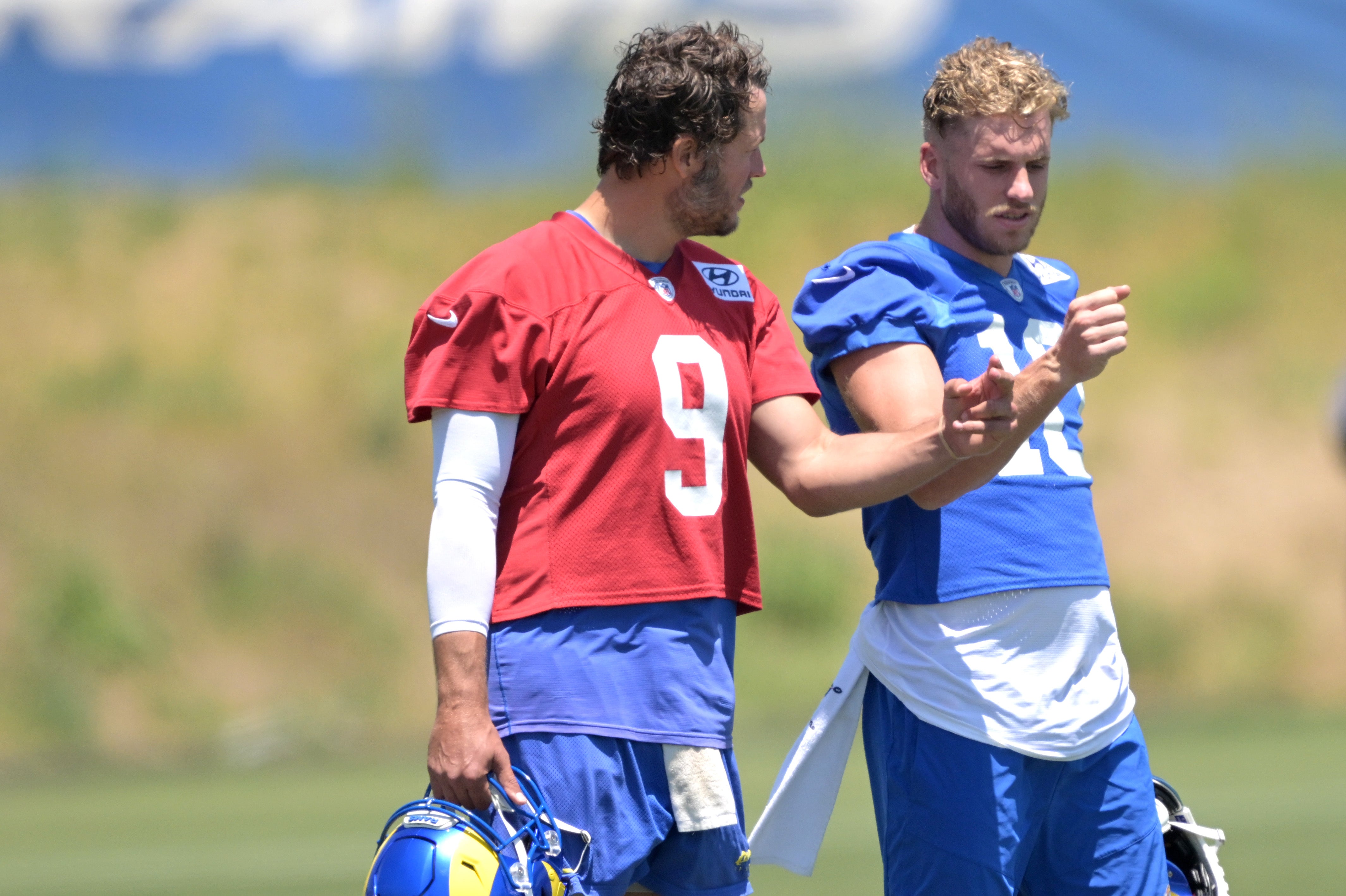 May 28, 2024; Thousand Oaks, CA, USA; Los Angeles Rams quarterback Matthew Stafford (9) and wide receiver Cooper Kupp (10) during OTAs at the team training facility at California Lutheran University. Mandatory Credit: Jayne Kamin-Oncea-USA TODAY Sports