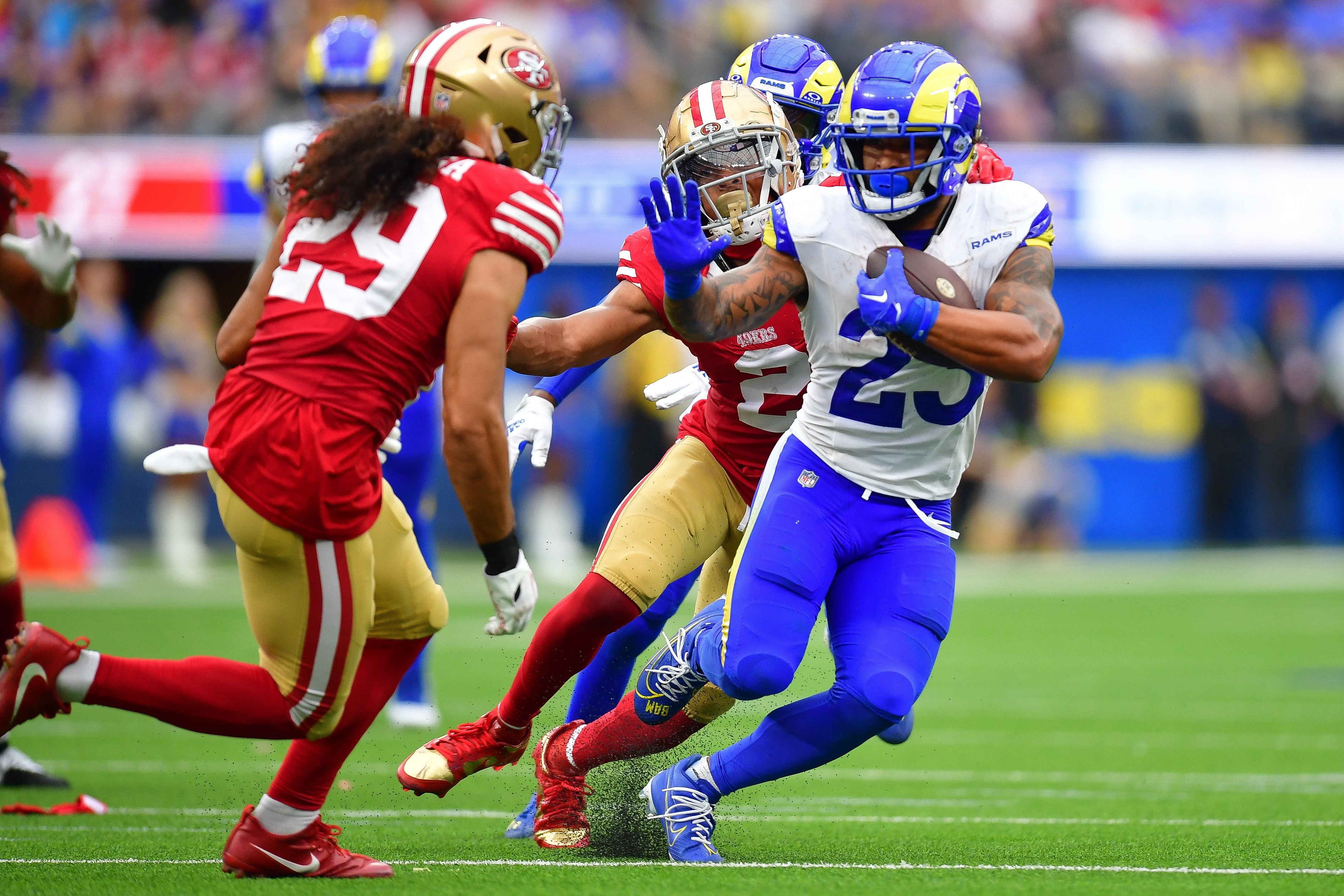 Sep 17, 2023; Inglewood, California, USA; Los Angeles Rams running back Kyren Williams (23) runs the ball against the San Francisco 49ers during the second half at SoFi Stadium.