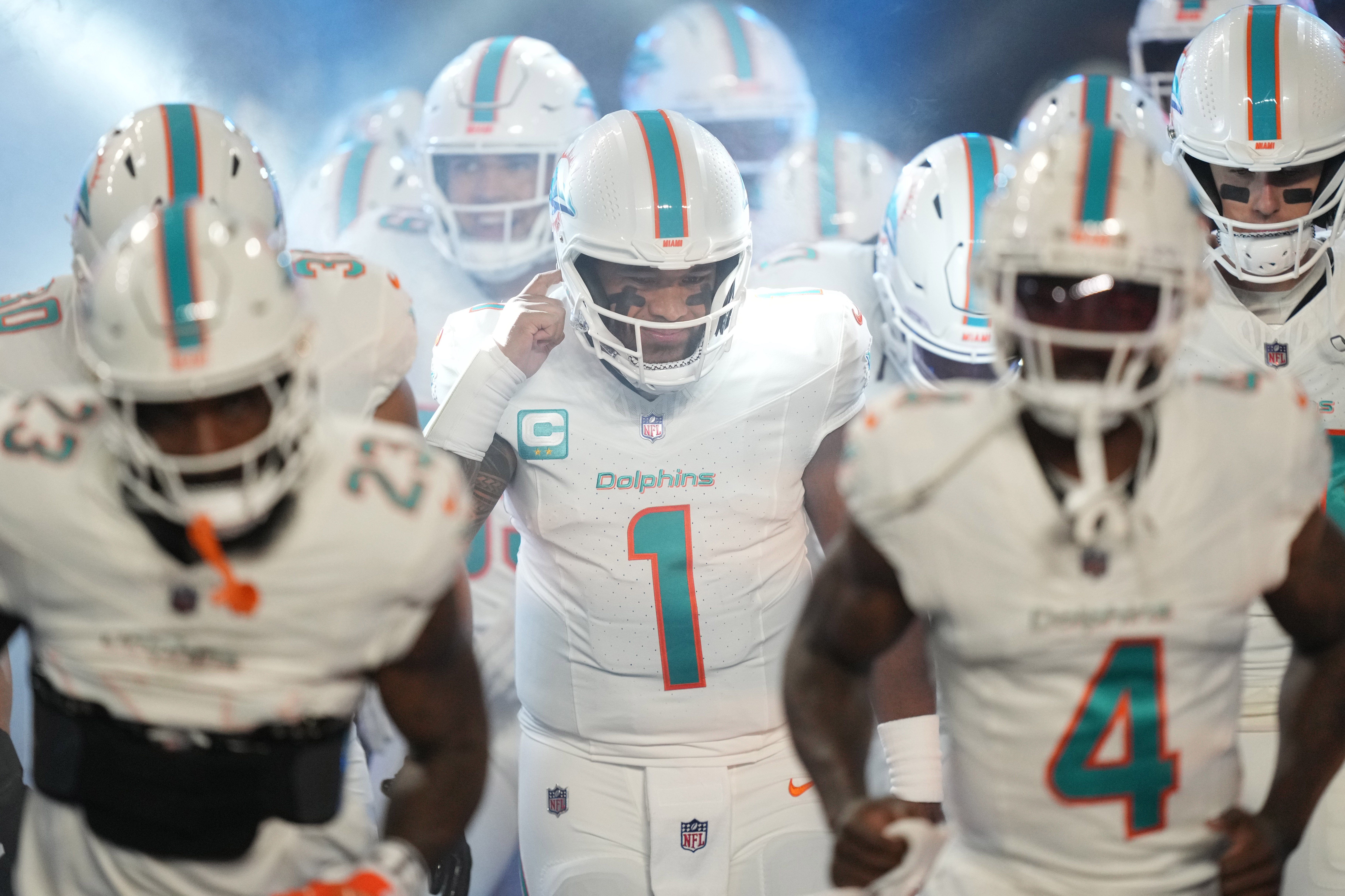 Miami Dolphins quarterback Tua Tagovailoa (1) heads out for warm-ups before the game against the Miami Dolphins at Hard Rock Stadium.