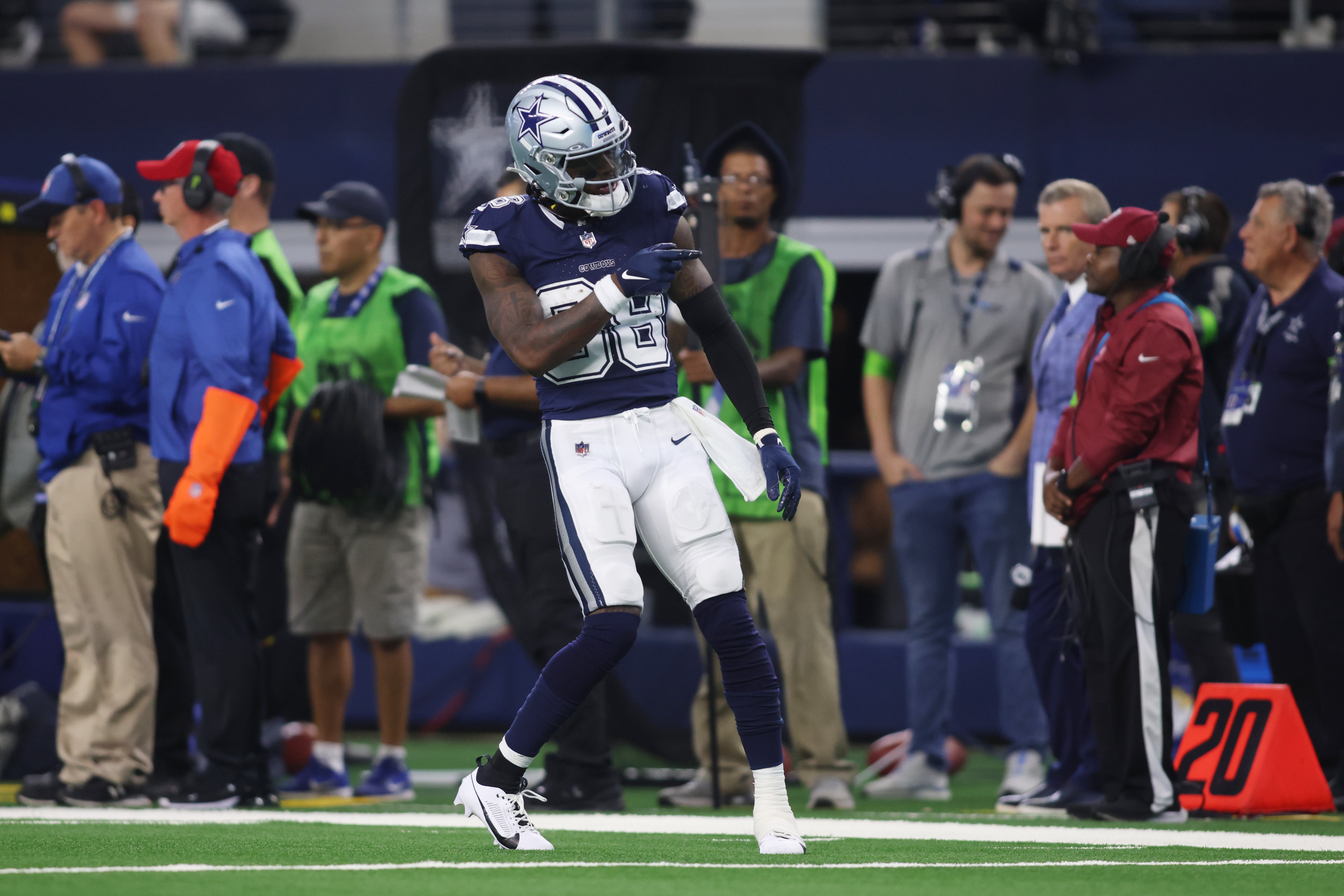Dallas Cowboys wide receiver CeeDee Lamb (88) reacts after making a catch in the second half against the Los Angeles Rams at AT&T Stadium.