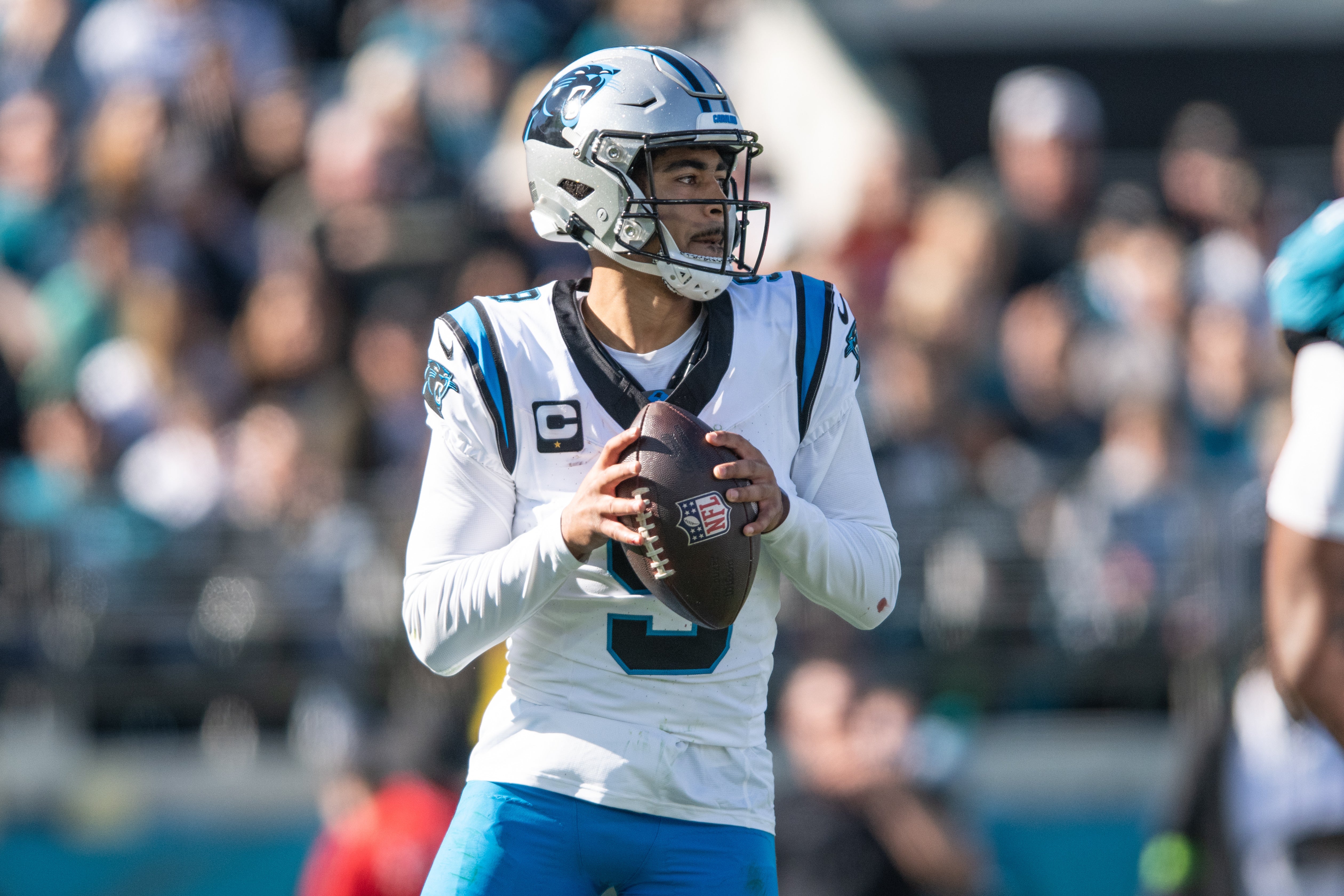 Dec 31, 2023; Jacksonville, Florida, USA; Carolina Panthers quarterback Bryce Young (9) gets ready to throw the ball against the Jacksonville Jaguars in the first quarter at EverBank Stadium. Mandatory Credit: Jeremy Reper-USA TODAY Sports