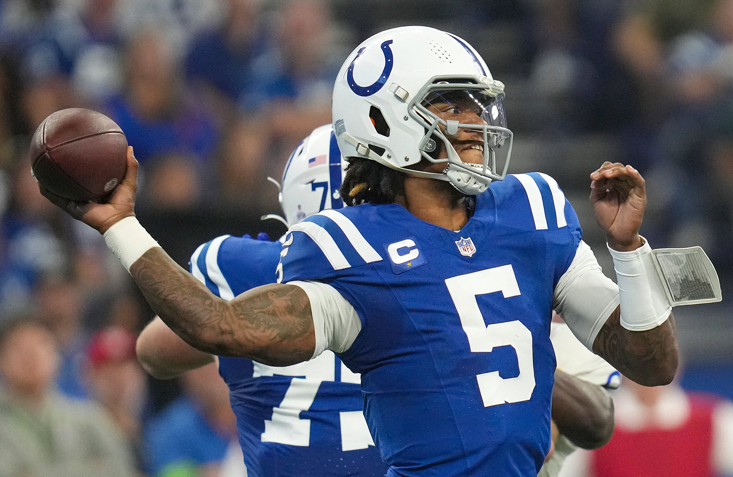Oct 1, 2023; Indianapolis, Indiana, USA; Indianapolis Colts quarterback Anthony Richardson (5) passes during the first half of the game against the Los Angeles Rams at Lucas Oil Stadium.