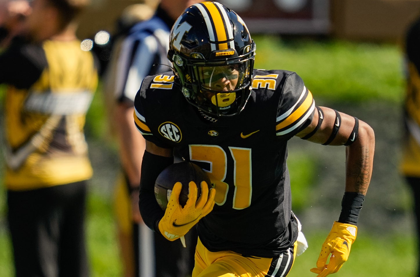 Oct 16, 2021; Columbia, Missouri, USA; Missouri Tigers wide receiver D'ionte Smith (31) returns a kickoff against the Texas A&M Aggies during the second half at Faurot Field at Memorial Stadium.
