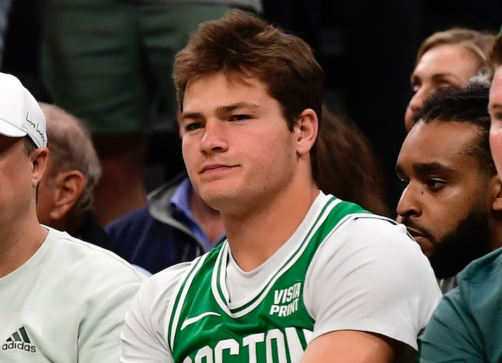 May 21, 2024; Boston, Massachusetts, USA; New England Patriot QB Drake Maye watches during the first half for game one of the eastern conference finals for the 2024 NBA playoffs at TD Garden.