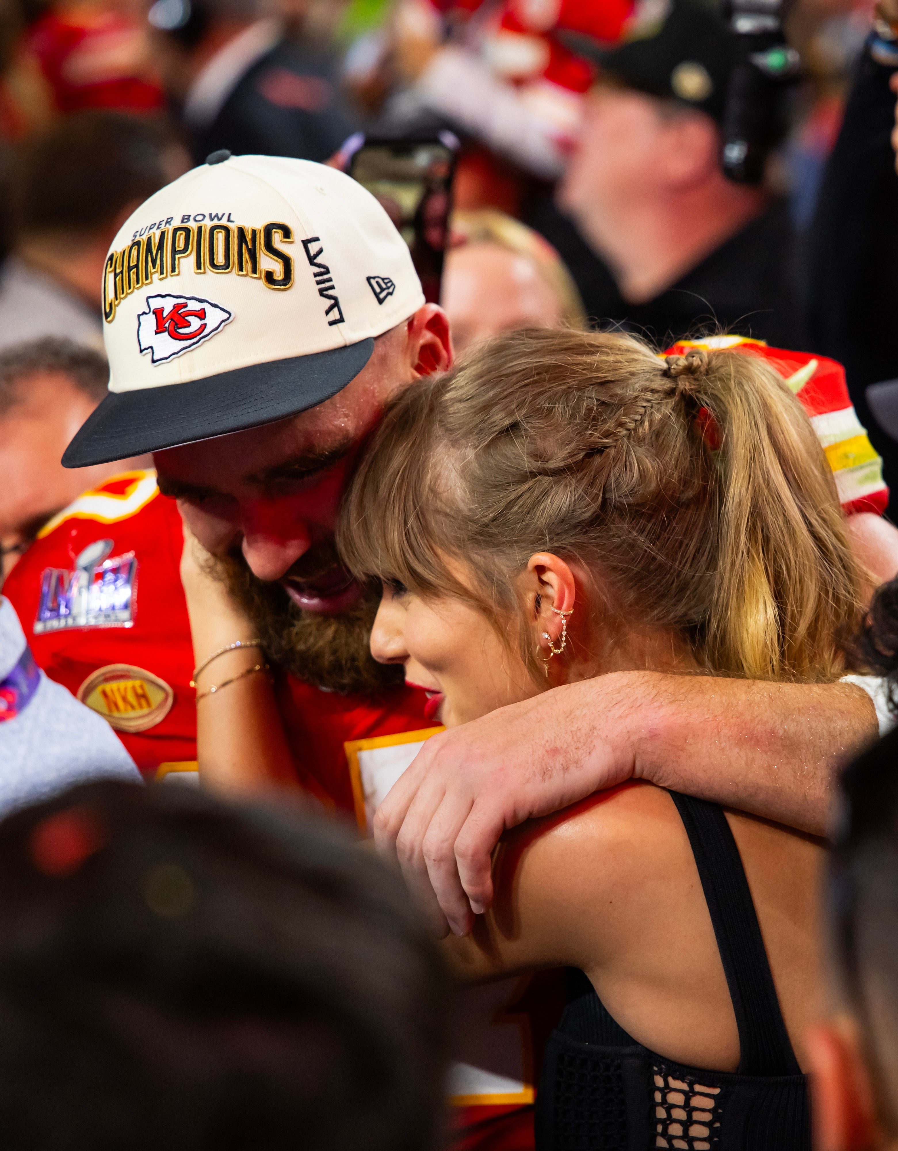 Feb 11, 2024; Paradise, Nevada, USA; Kansas City Chiefs tight end Travis Kelce (87) celebrates with girlfriend Taylor Swift after defeating the San Francisco 49ers in Super Bowl LVIII at Allegiant Stadium.