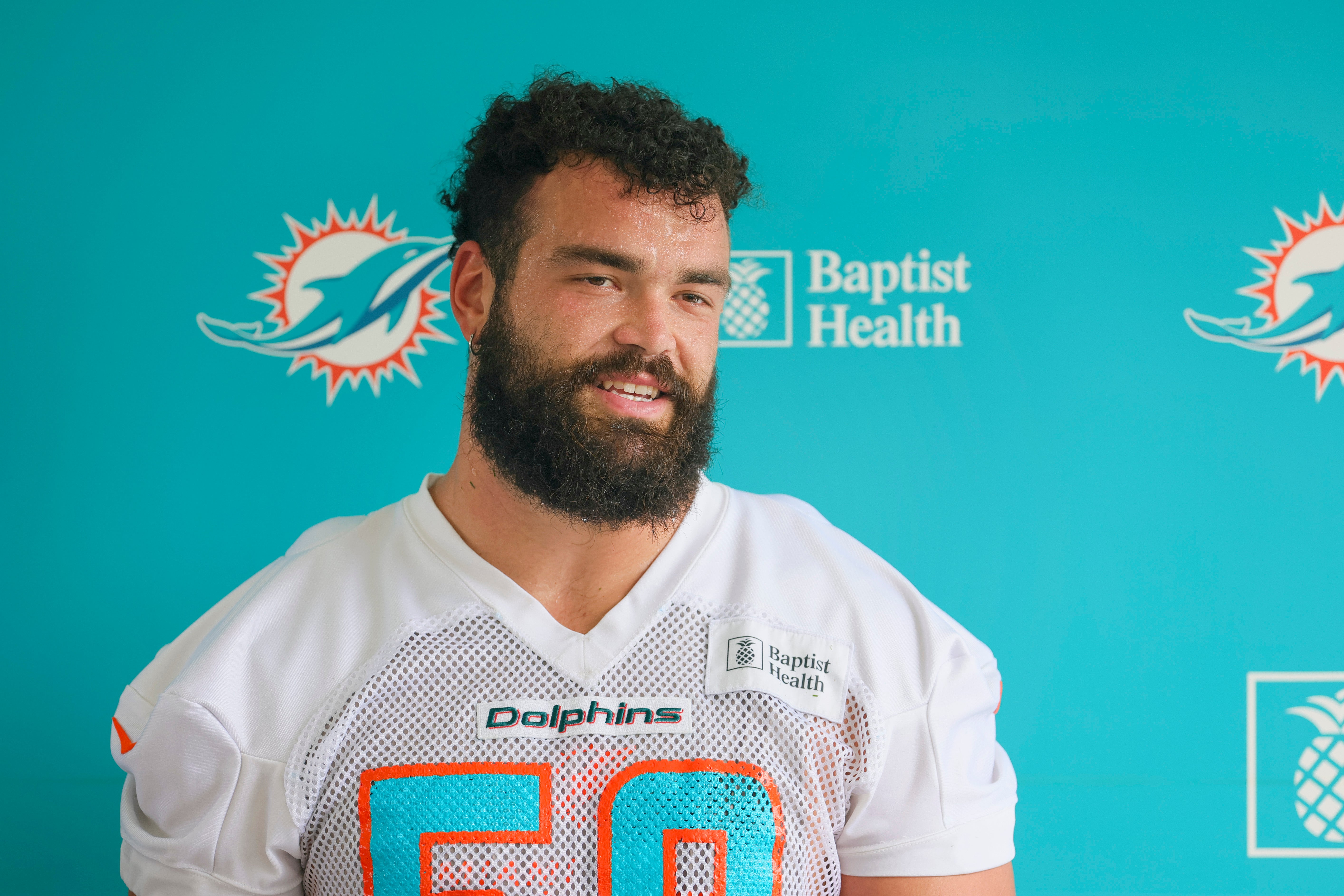Jul 26, 2023; Miami Gardens, FL, USA; Miami Dolphins guard Connor Williams (58) talks to reporters during training camp at Baptist Health Training Facility.