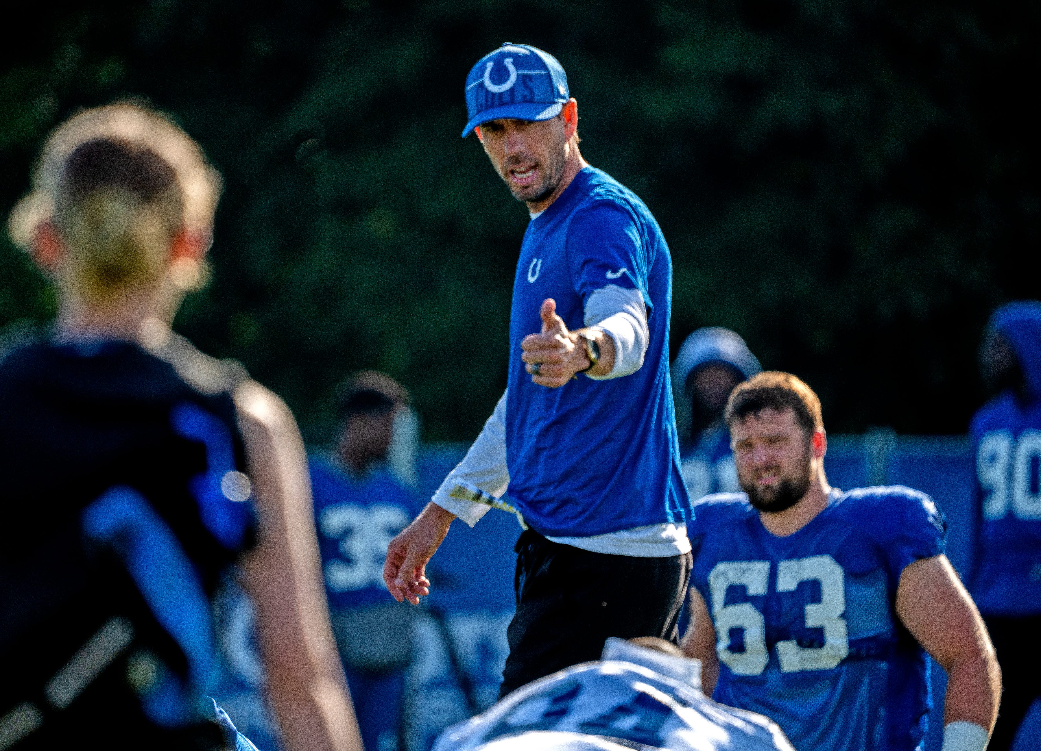 Indianapolis Colts head coach Shane Steichen greets warming-up players during day #9 practice of Colts Camp, Tuesday, Aug. 8, 2023 at Grand Park in Westfield.