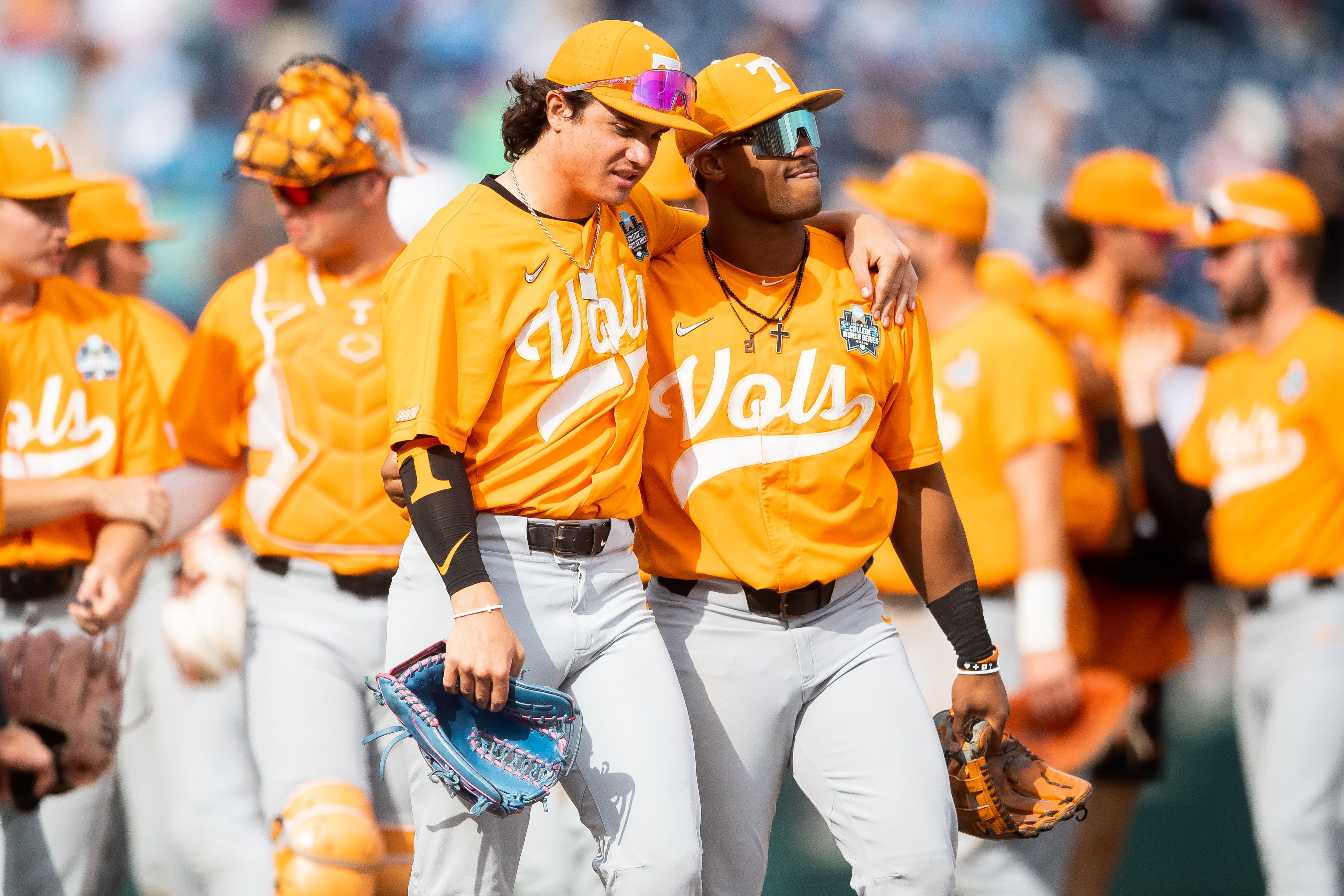 Tennessee players walk off the field after their second NCAA College World Series win against Florida State at Charles Schwab Field in Omaha, Neb., on Wednesday, June 19, 2024.