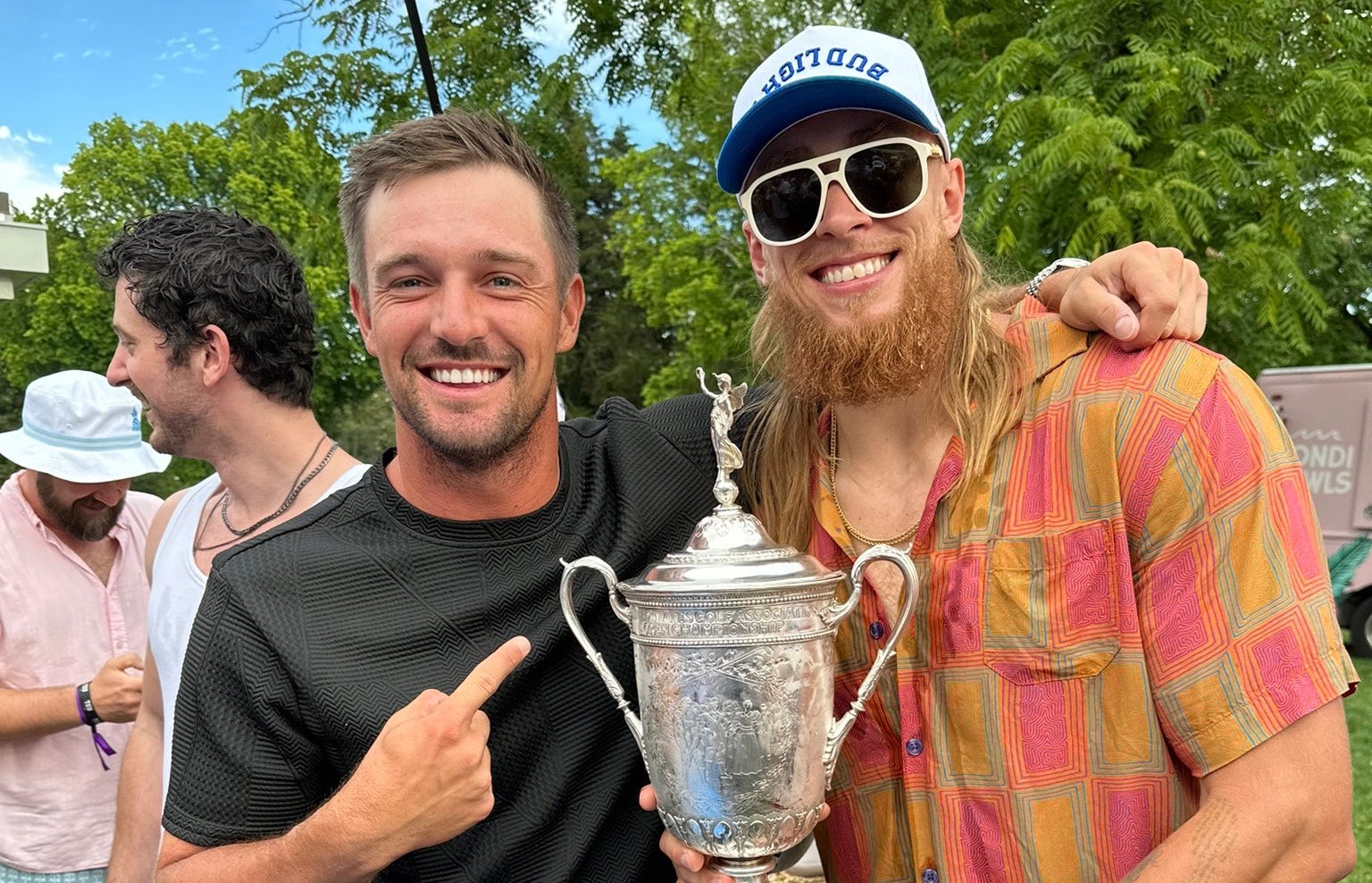 George Kittle (right) with US Open champion Bryson DeChambeau (left).