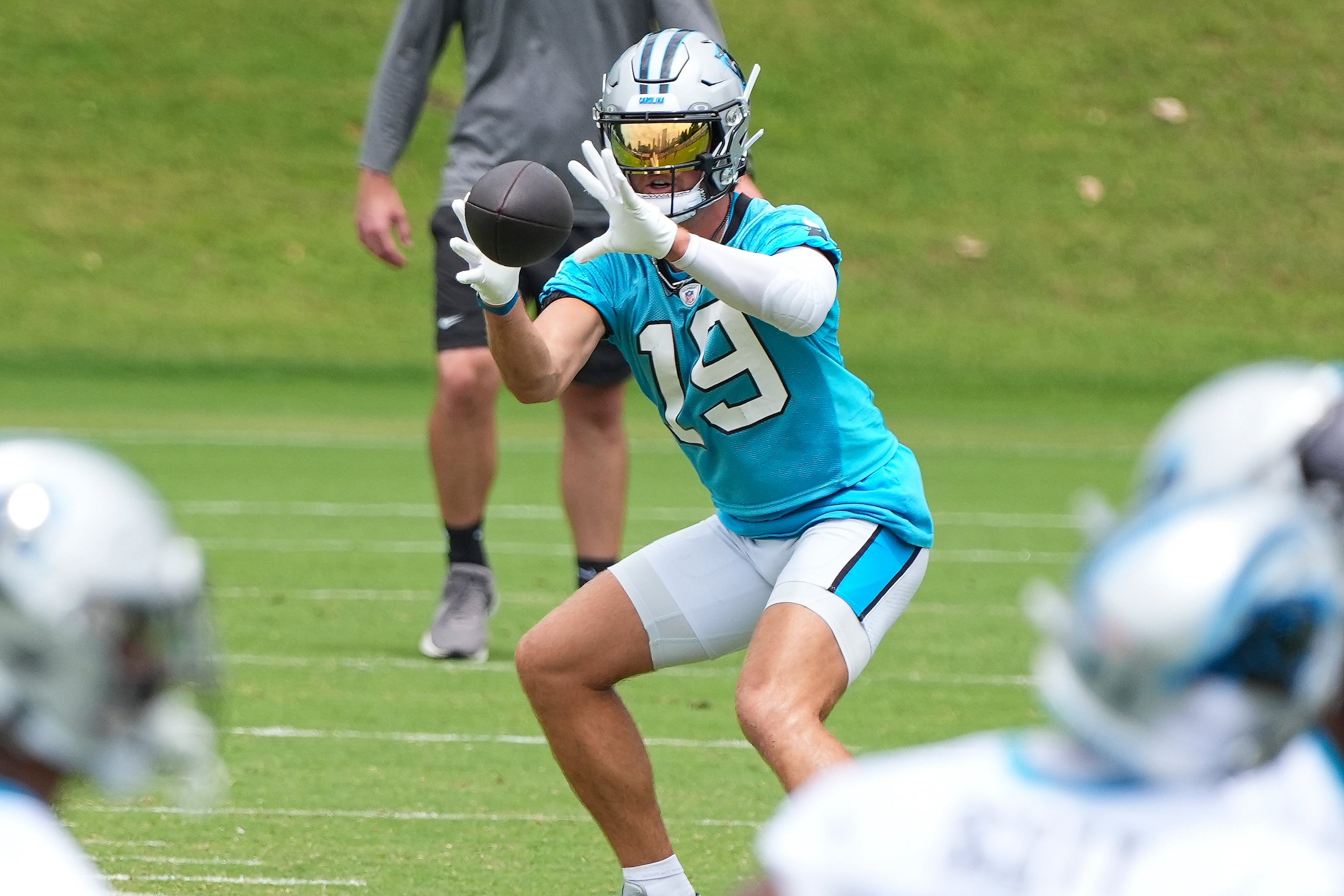 Jun 4, 2024; Charlotte, NC, USA; Carolina Panthers wide receiver Adam Thielen (19) makes a catch during OTAs. Mandatory Credit: Jim Dedmon-USA TODAY Sports