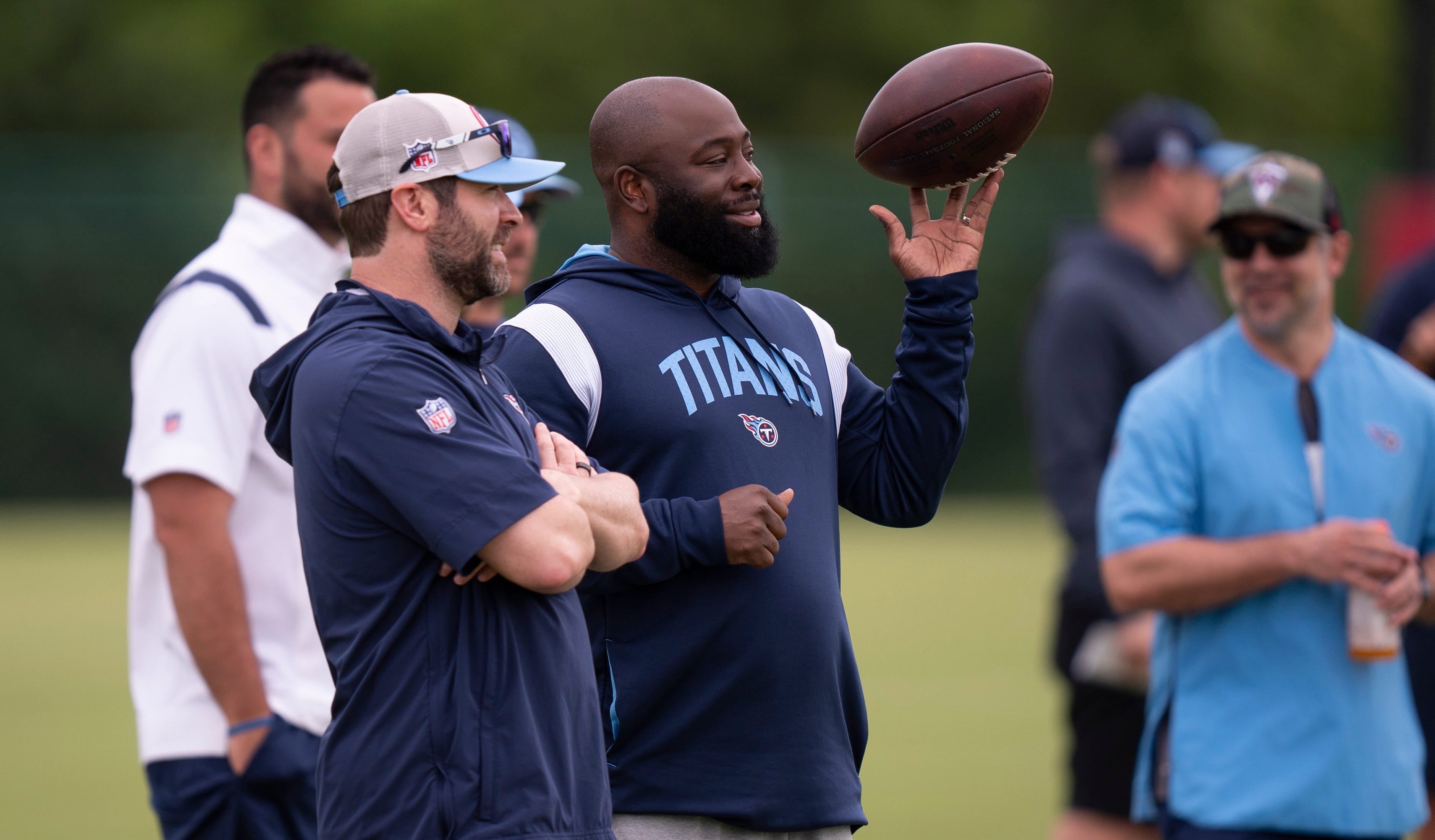 Tennessee Titans Head Coach Brian Callahan, left, and General Manager Ran Carthon, with ball, take in practice during rookie minicamp at Ascension Saint Thomas Sports Park in Nashville, Tenn., Friday,... Denny Simmons / The Tennessean-USA TODAY NETWORK