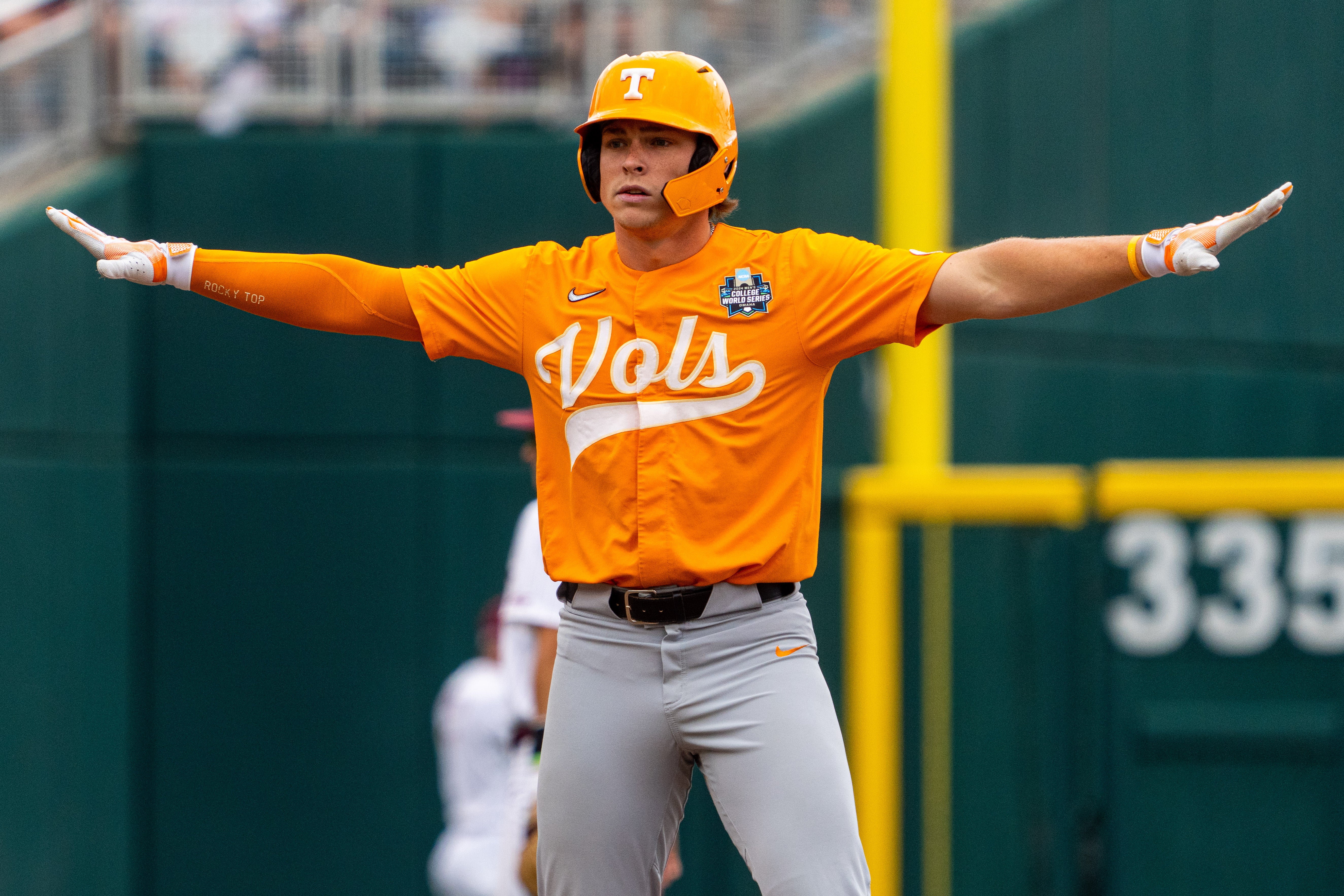 Jun 19, 2024; Omaha, NE, USA; Tennessee Volunteers third baseman Billy Amick (11) reacts after hitting a double against the Florida State Seminoles during the seventh inning at Charles Schwab Field Omaha.