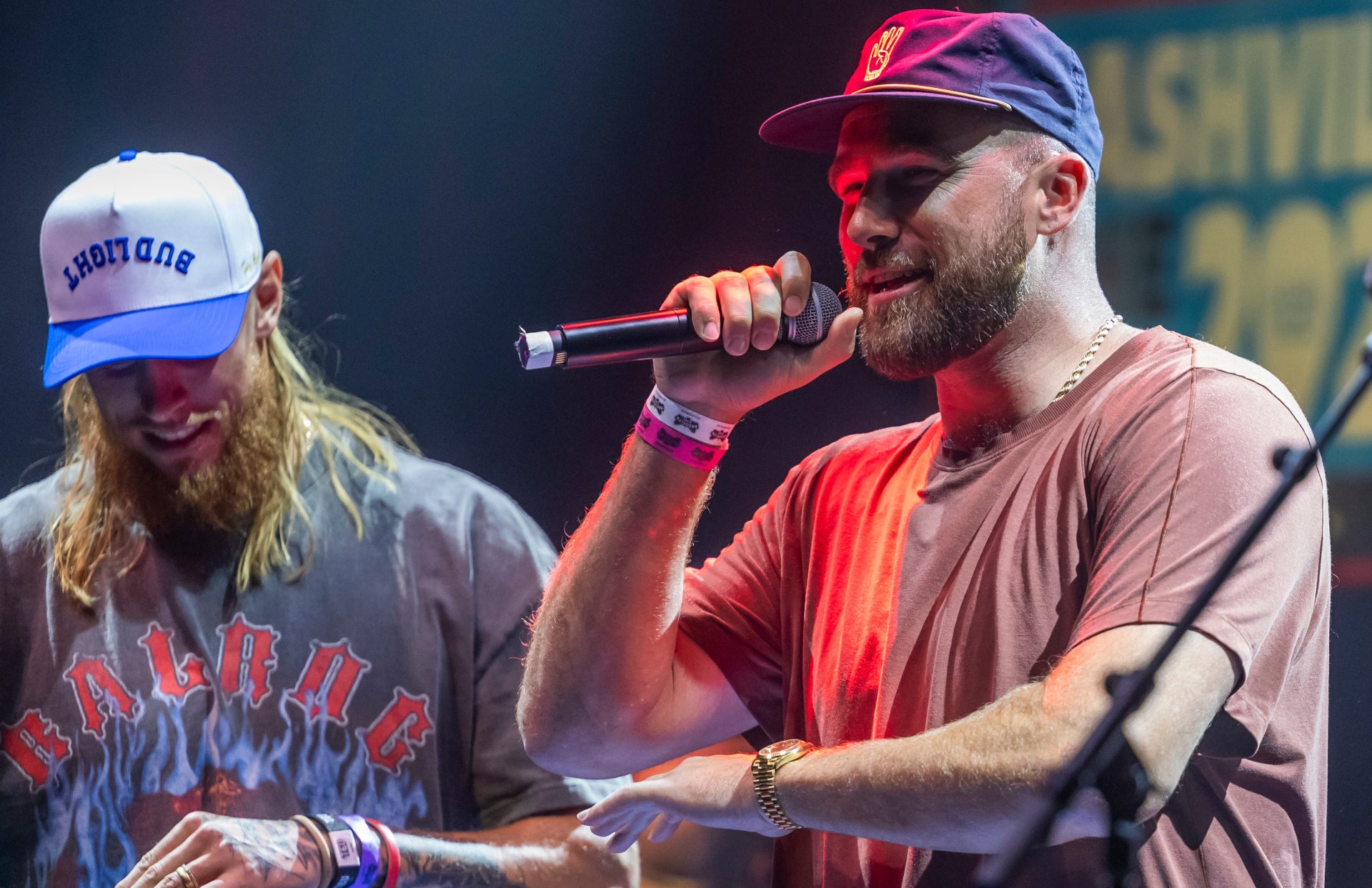 George Kittle and Travis Kelce greet the crowd during the “Tight Ends & Friends” concert at Brooklyn Bowl Tuesday, June 18, 2024 in Nashville, Tenn.