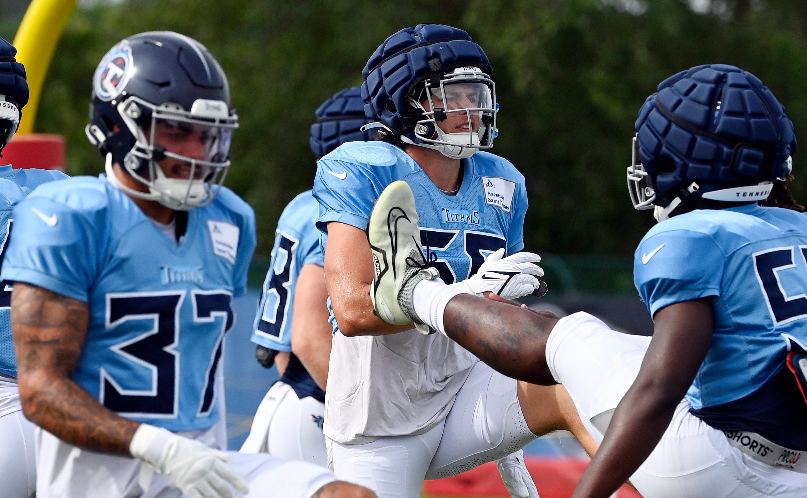 Tennessee Titans linebacker Jack Gibbens, center, warms up during an NFL football training camp practice Tuesday, August 8, 2023, in Nashville, Tenn Mark Zaleski / The Tennessean-USA TODAY NETWORK