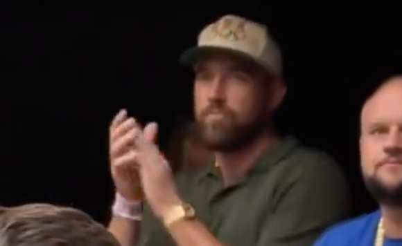 Travis Kelce dances along during Taylor Swift's Eras Tour performance in Wembley Stadium