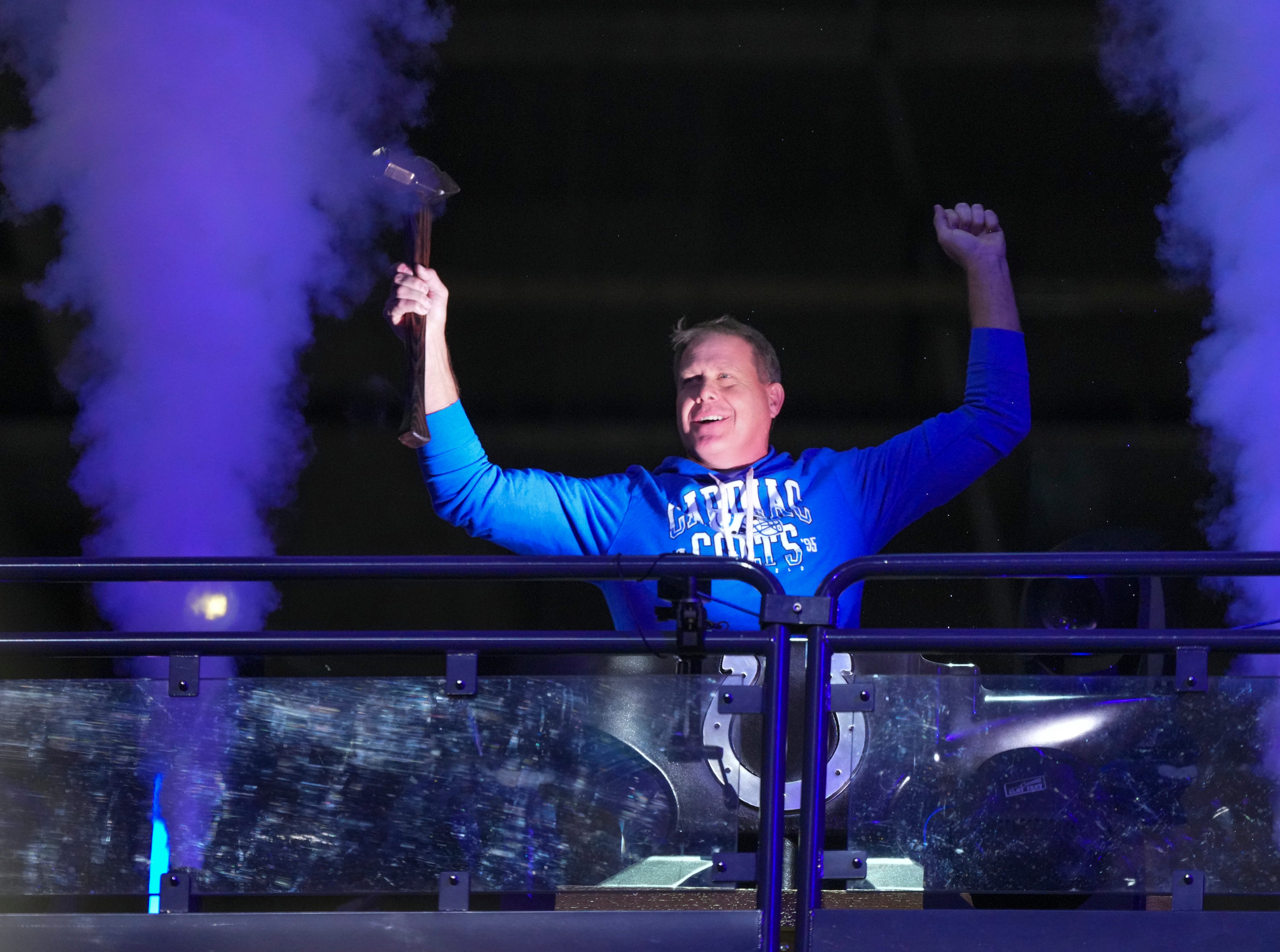 Former Colts great Ken Dilger uses a hammer and anvil to ring in the start of the game against New Orleans, Sunday., Oct 29, 2023, at Lucas Oil Stadium in Indianapolis.