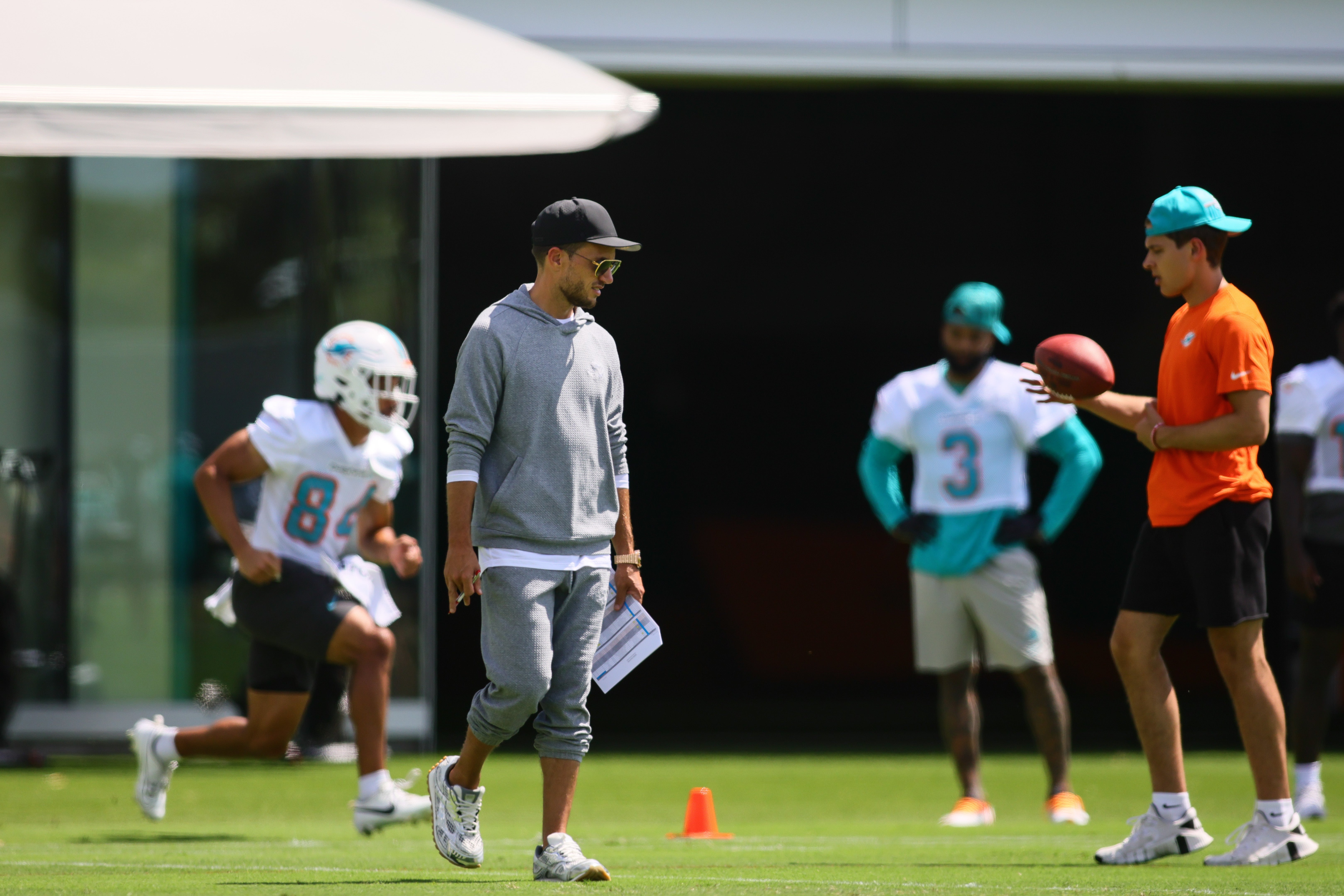 Jun 5, 2024; Miami Gardens, FL, USA; Miami Dolphins head coach Mike McDaniel looks on during mandatory minicamp at Baptist Health Training Complex.