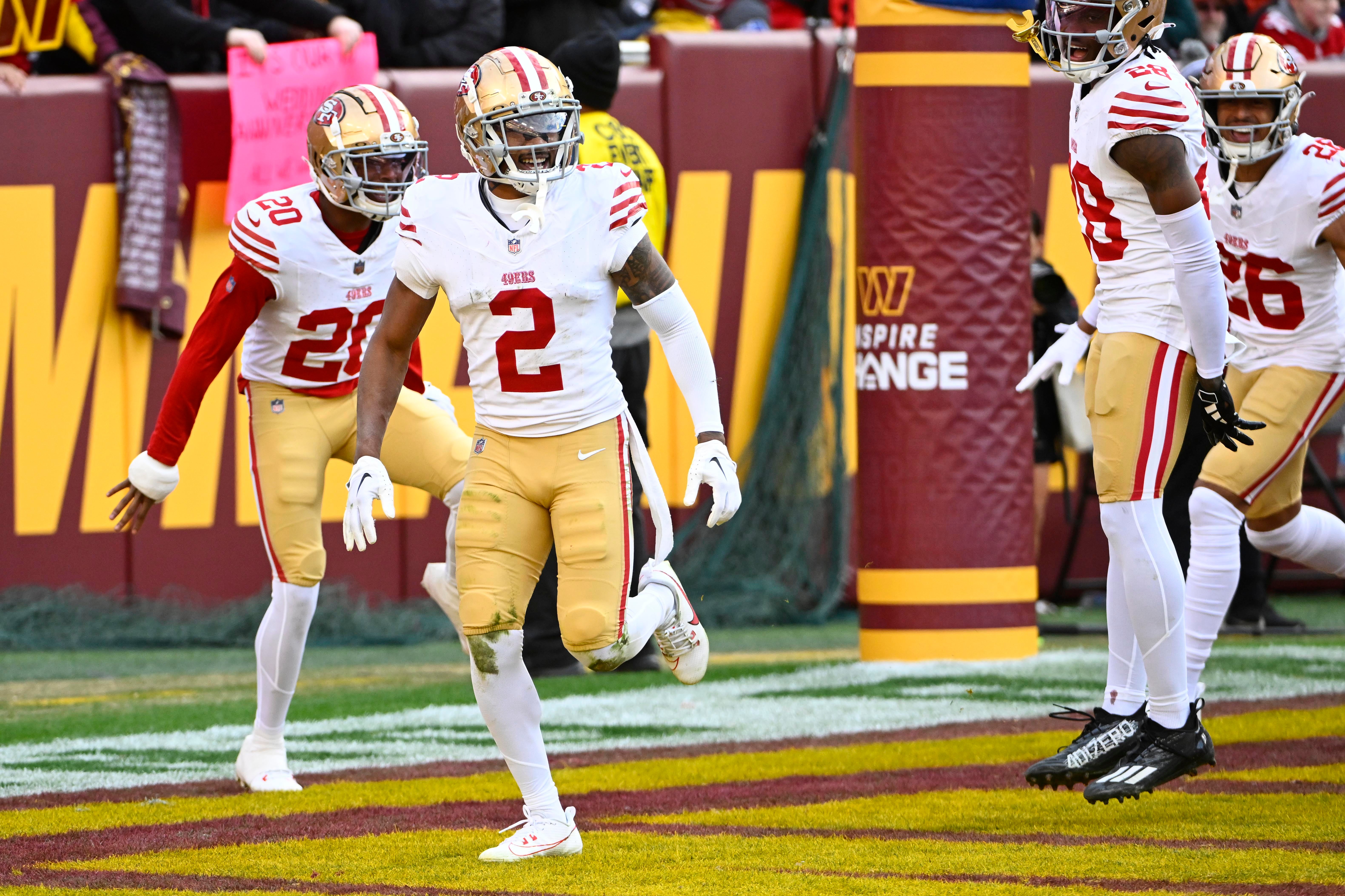 Dec 31, 2023; Landover, Maryland, USA; San Francisco 49ers cornerback Deommodore Lenoir (2) reacts after intercepting a pass against the Washington Commanders during the second half at FedExField.