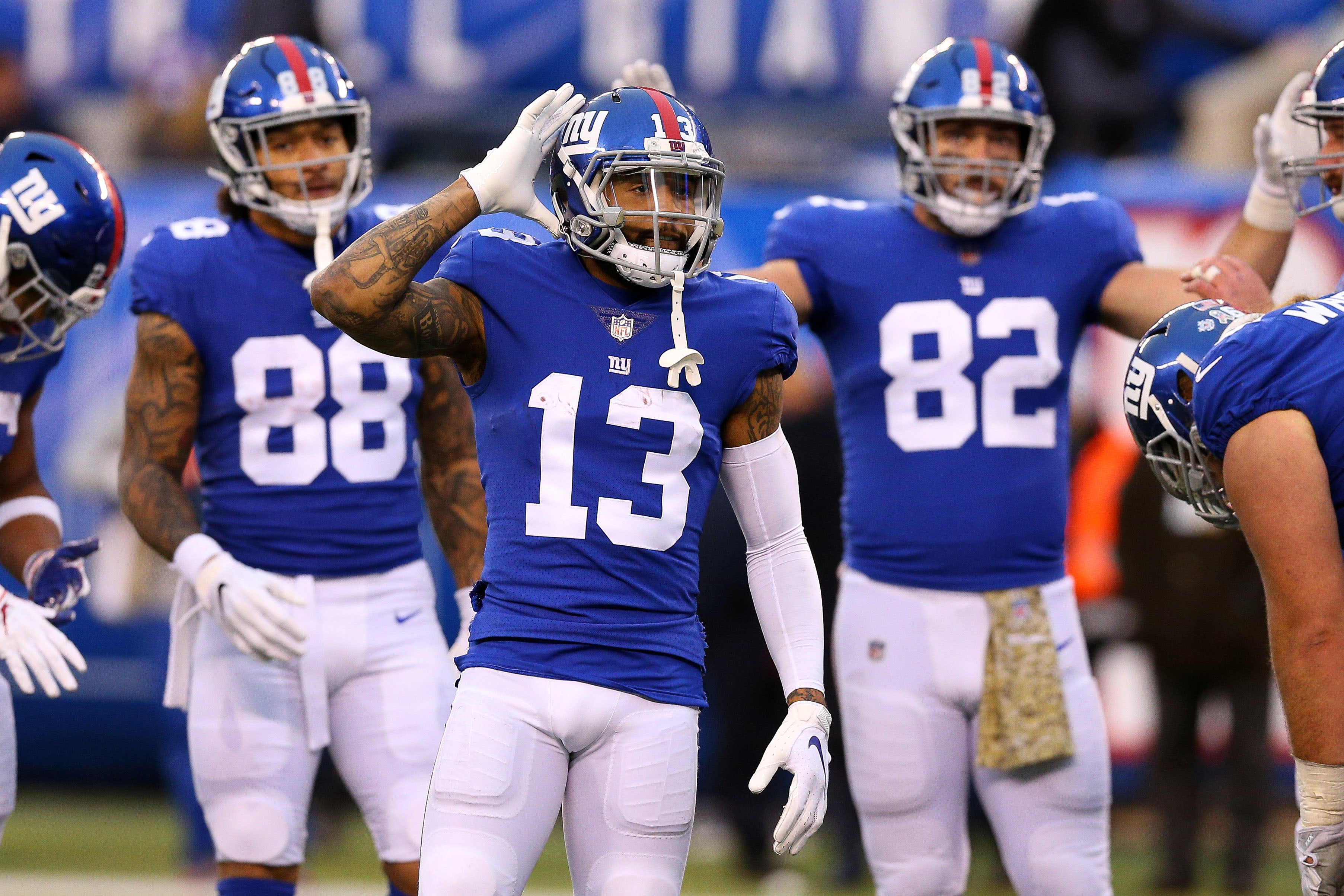 New York Giants wide receiver Odell Beckham (13) signals to fans during the second half against the Tampa Bay Buccaneers at MetLife Stadium.