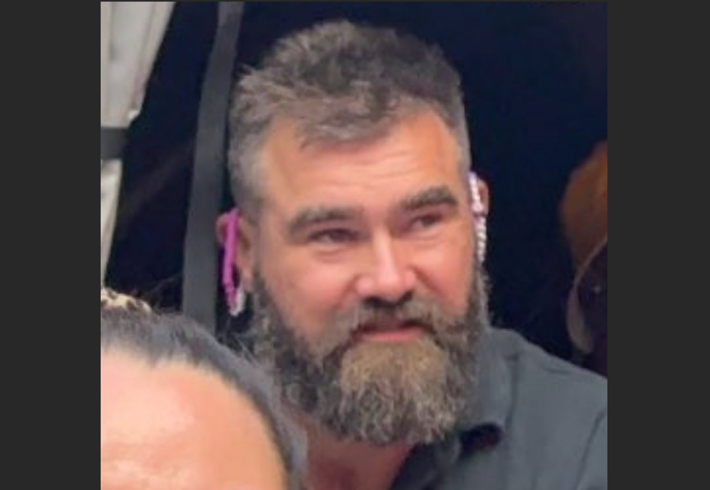 Jason Kelce wearing friendship bracelets on his ears at the Eras Tour at Wembley Stadium over the weekend.