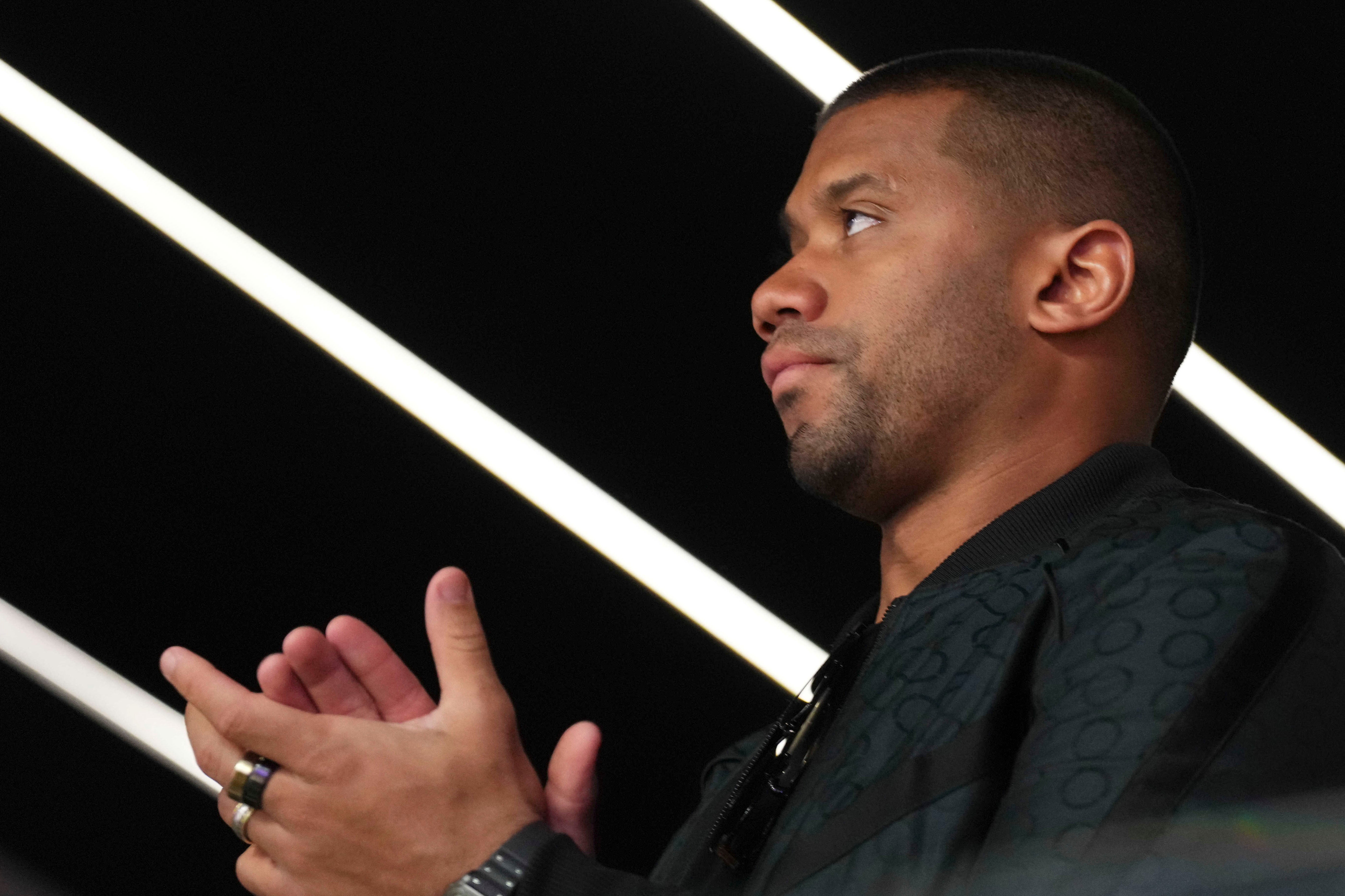 Feb 11, 2024; Paradise, Nevada, USA; Denver Broncos quarterback Russell Wilson watches play during the third quarter of Super Bowl LVIII between Kansas City Chiefs and San Francisco 49ers at Allegiant Stadium. Mandatory Credit: Joe Camporeale-USA TODAY Sports  