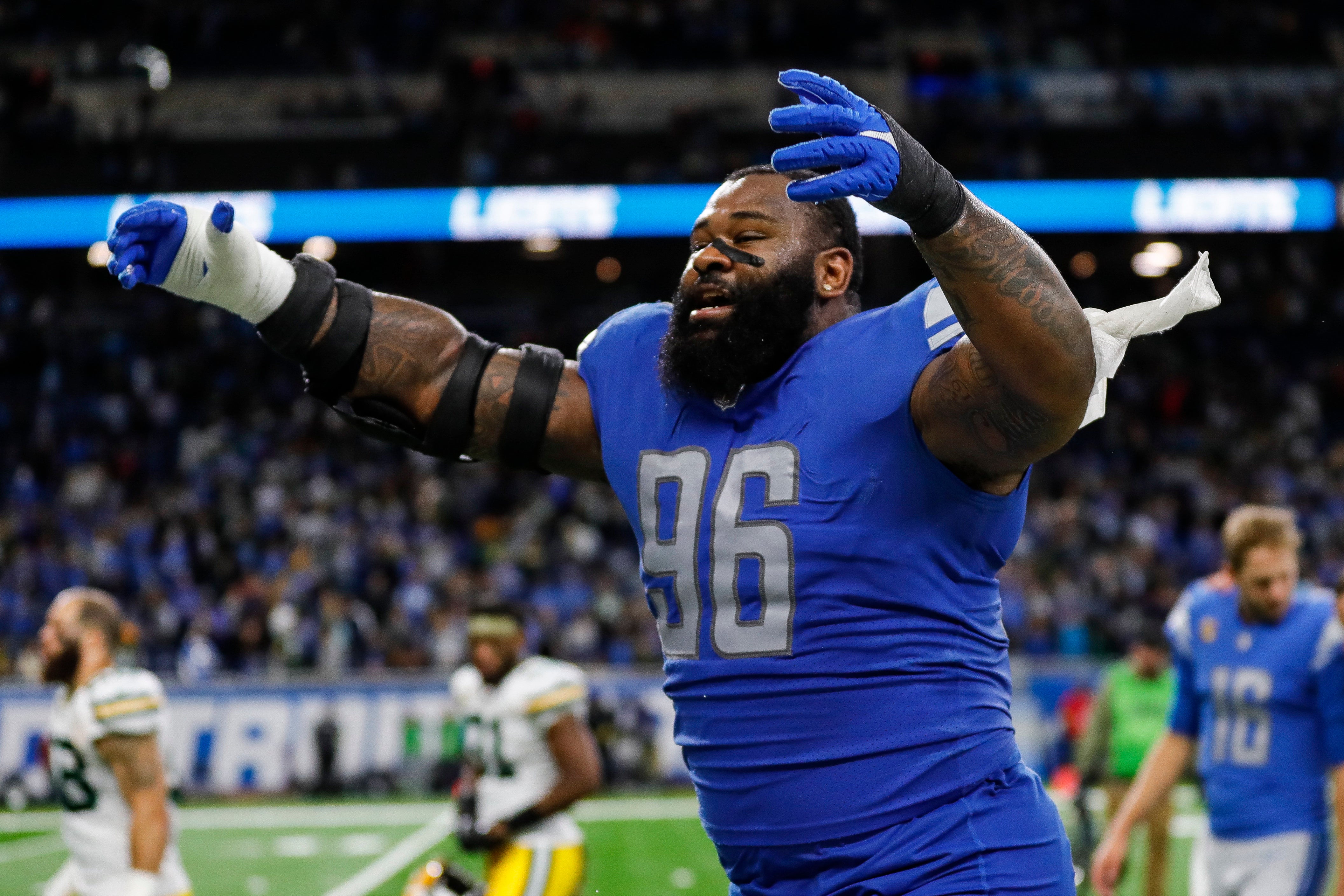 Nov 6, 2022; Detroit, Michigan, USA; Detroit Lions defensive end Isaiah Buggs (96) celebrates the Lions' 15-9 win over Green Bay Packers at Ford Field.