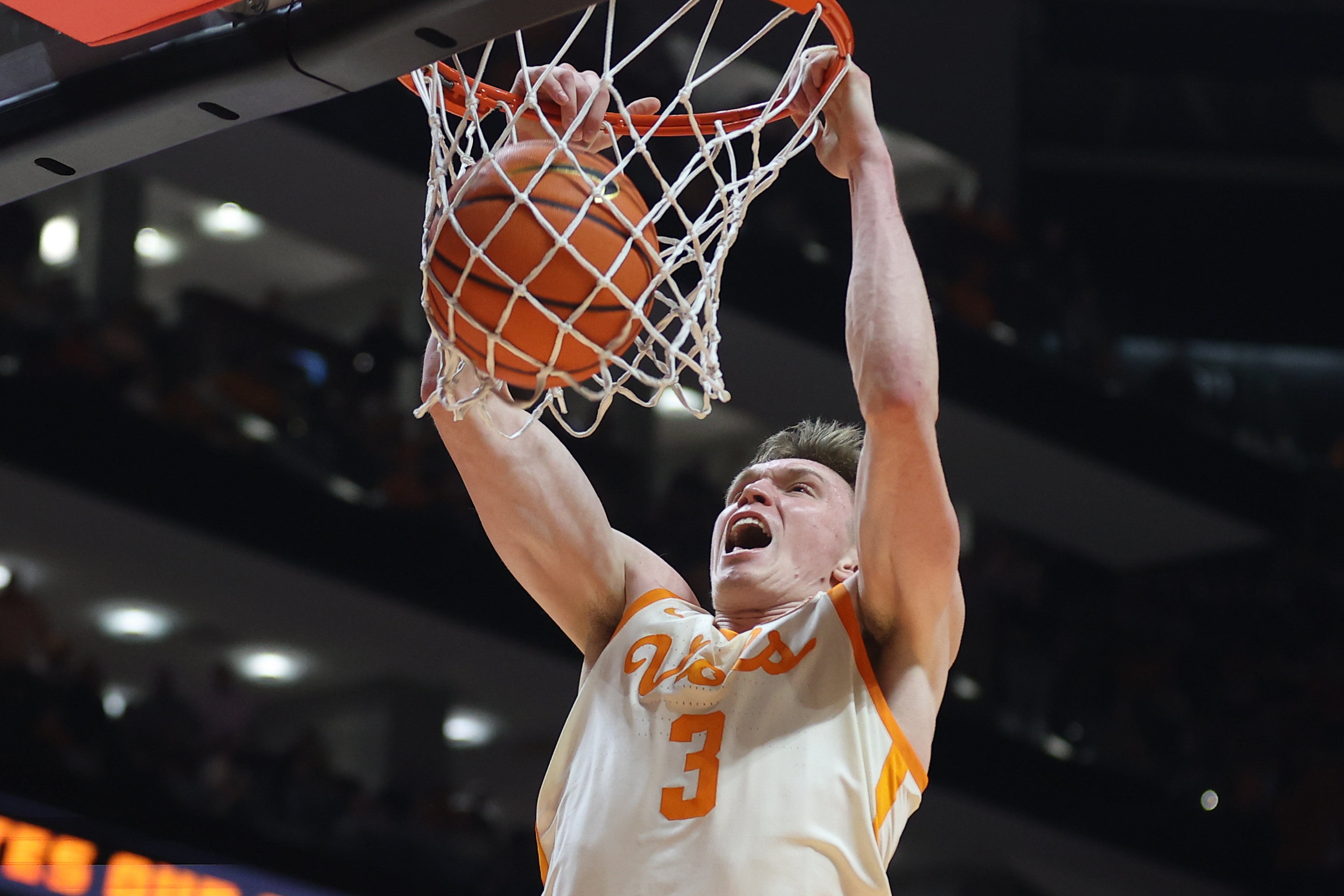 Feb 28, 2024; Knoxville, Tennessee, USA; Tennessee Volunteers guard Dalton Knecht (3) dunks the ball against the Auburn Tigers during the second half at Thompson-Boling Arena at Food City Center.