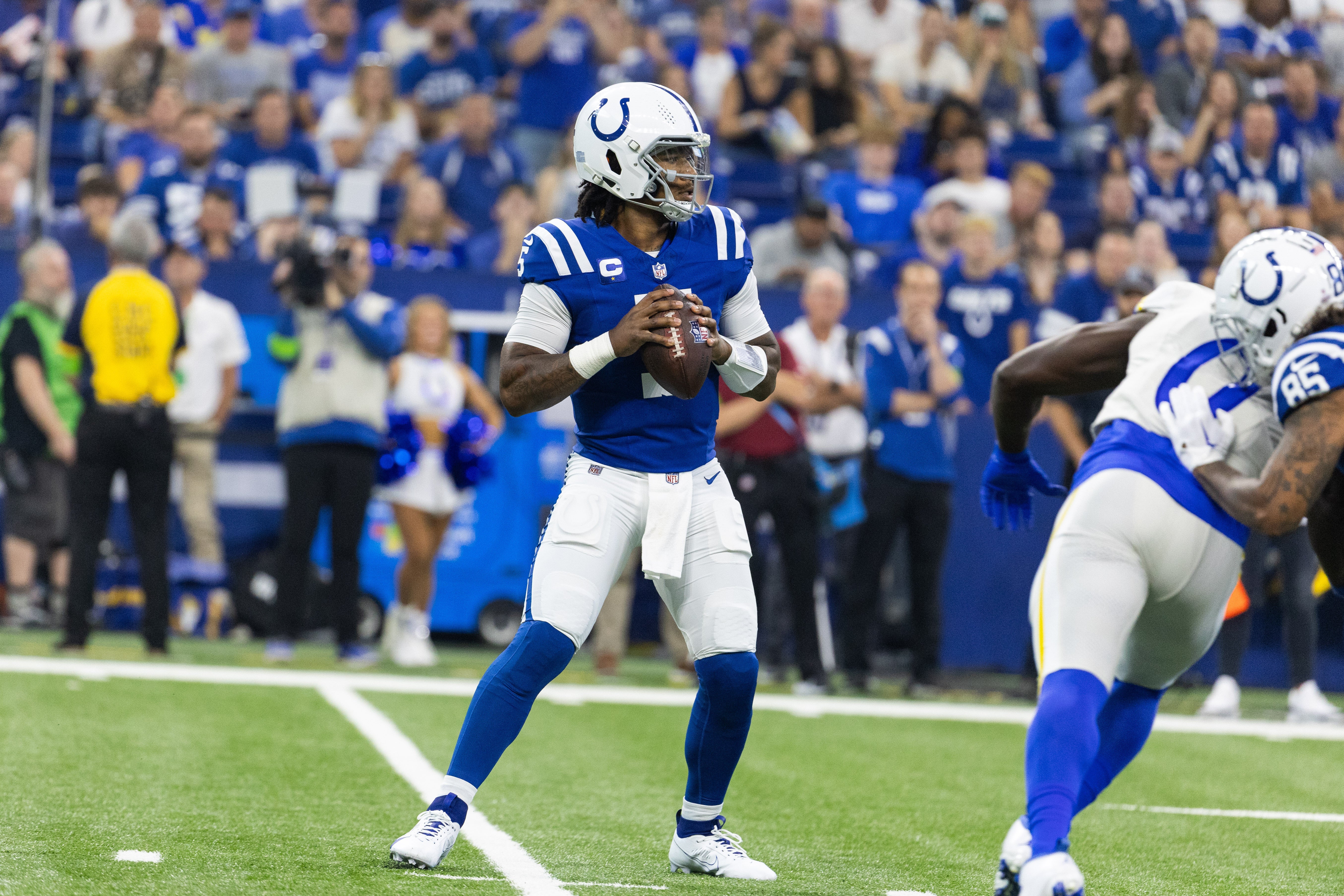 Oct 1, 2023; Indianapolis, Indiana, USA; Indianapolis Colts quarterback Anthony Richardson (5) drops back to pass the ball in the first quarter against the Los Angeles Rams at Lucas Oil Stadium.