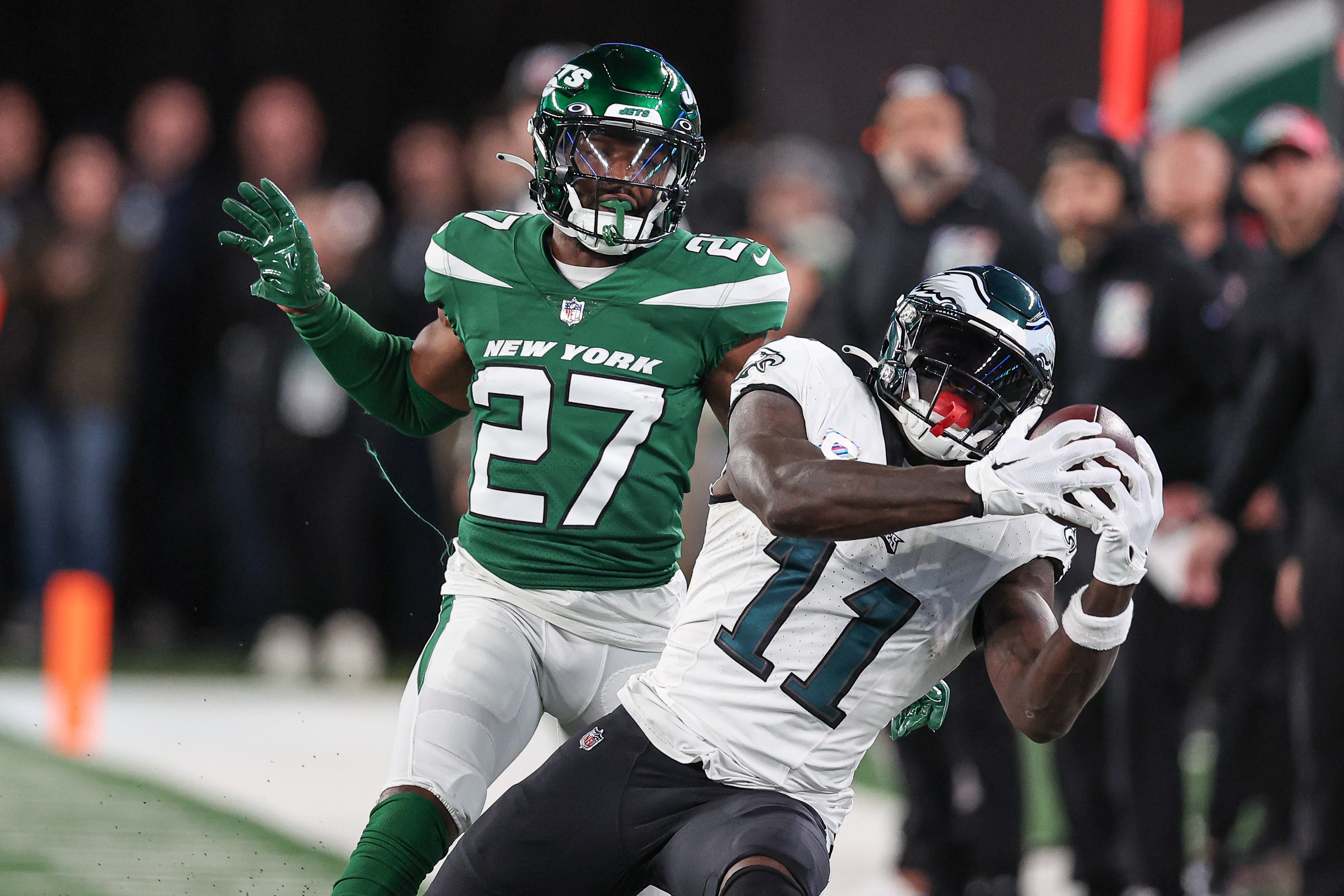 Philadelphia Eagles wide receiver A.J. Brown (11) catches the ball as New York Jets cornerback Tae Hayes (27) defends during the second half at MetLife Stadium.