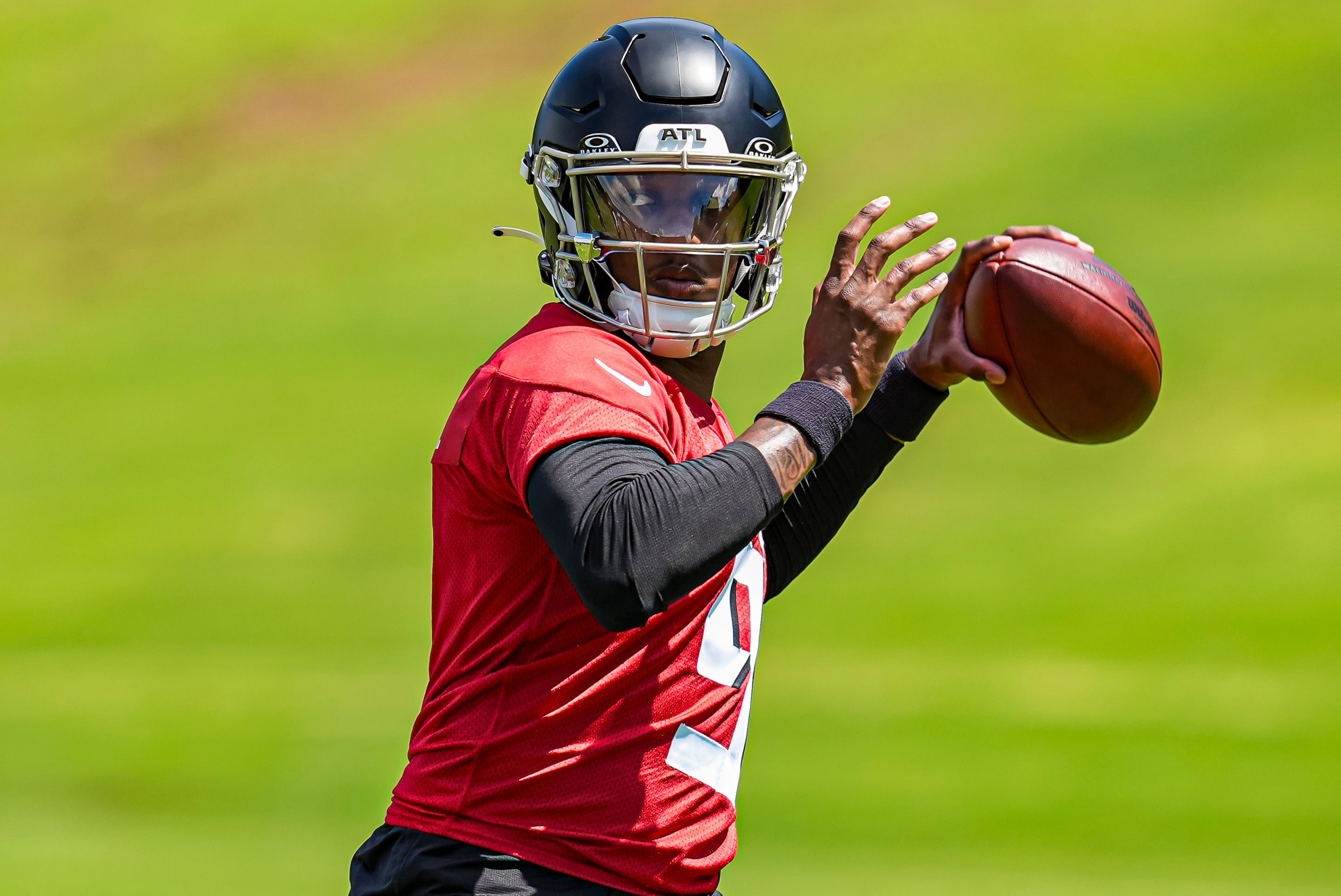 Atlanta Falcons quarterback Michael Penix Jr (9) passes the ball during Rookie Minicamp at the Falcons Training Camp.