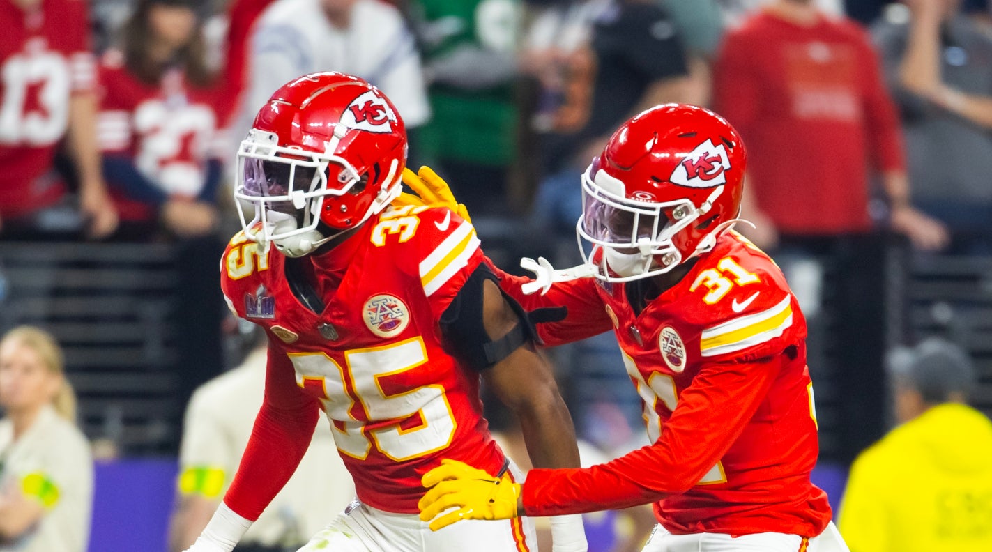 Feb 11, 2024; Paradise, Nevada, USA; Kansas City Chiefs cornerback Jaylen Watson (35) celebrates with Nic Jones (31) after recovering a muffed punt against the San Francisco 49ers in the second half in Super Bowl LVIII at Allegiant Stadium.