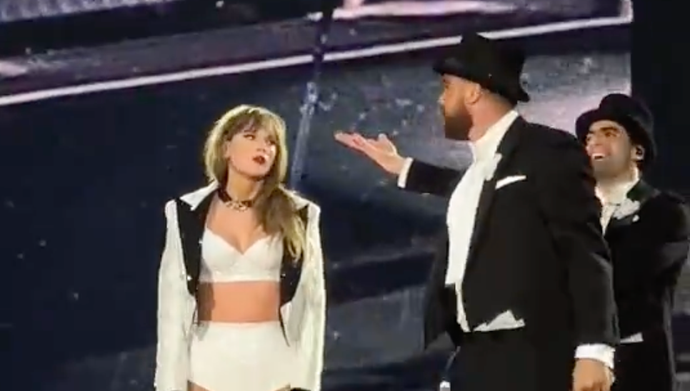 Travis Kelce joins Taylor Swift on stage during Night 3 of the Eras Tour at Wembley Stadium.