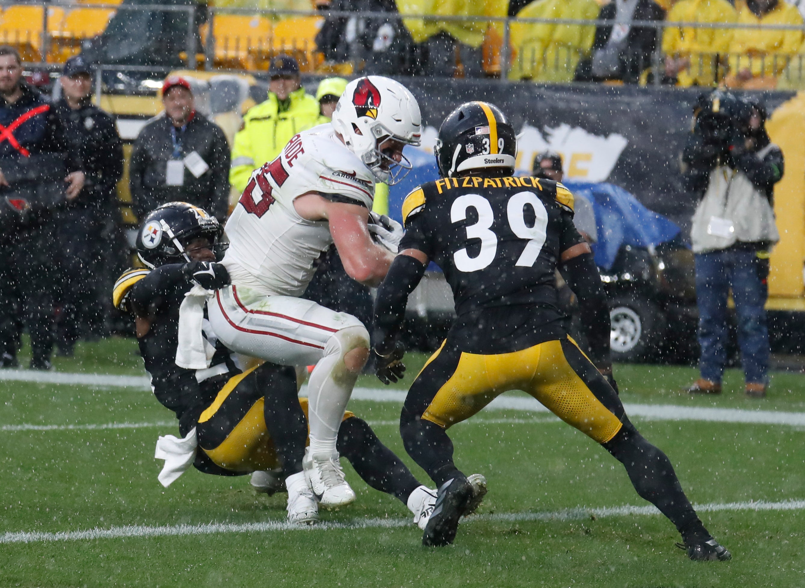 Dec 3, 2023; Pittsburgh, Pennsylvania, USA; Arizona Cardinals tight end Trey McBride (85) and Pittsburgh Steelers safeties Damontae Kazee (left) and Minkah Fitzpatrick (39) during the second quarter at Acrisure Stadium. Mandatory Credit: Charles LeClaire-USA TODAY Sports