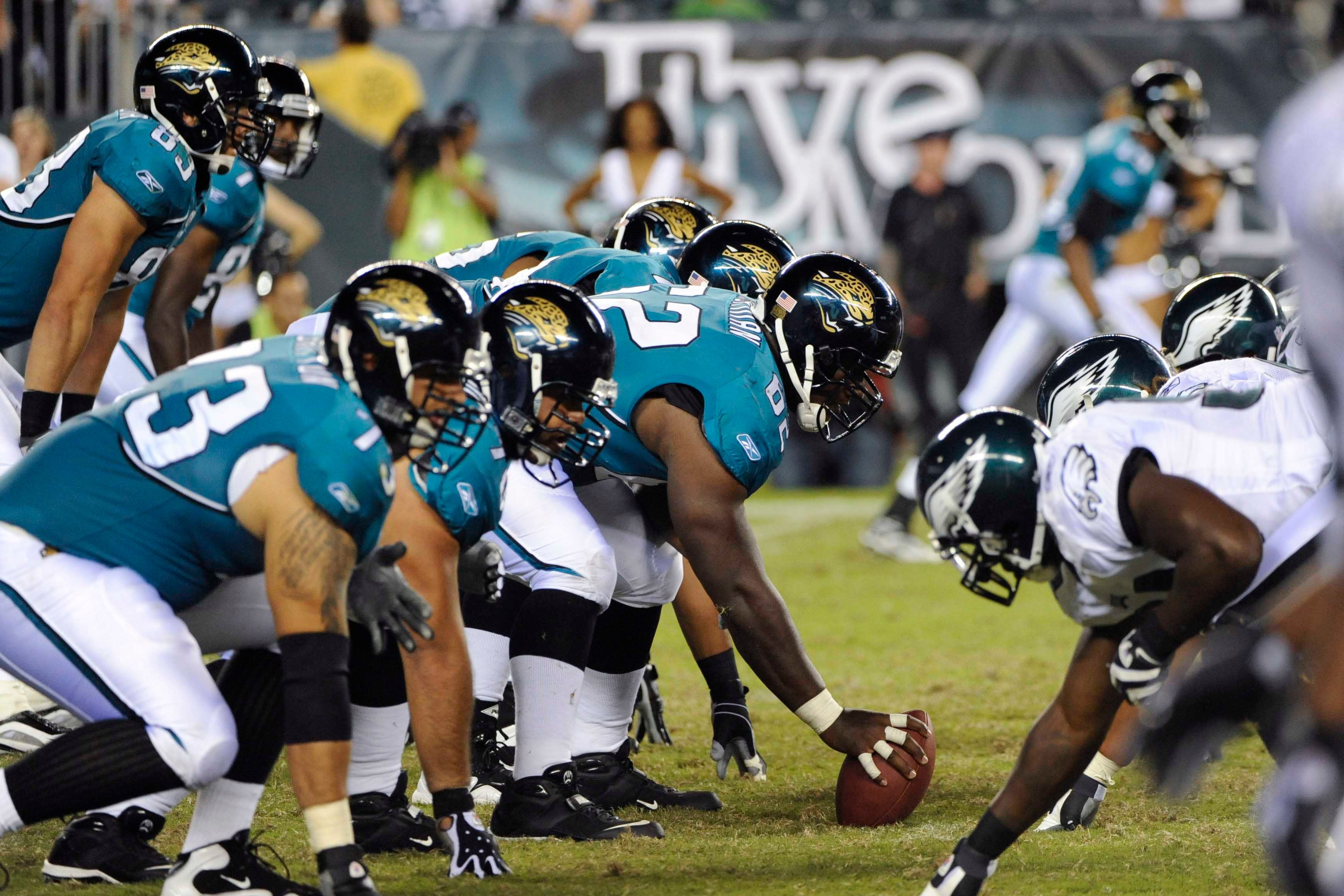 Jacksonville Jaguars center Dennis Norman (62) readies to snap the ball during the third quarter of a preseason game against the Philadelphia Eagles at Lincoln Financial Field. The Eagles defeated the Jaguars 33-32.