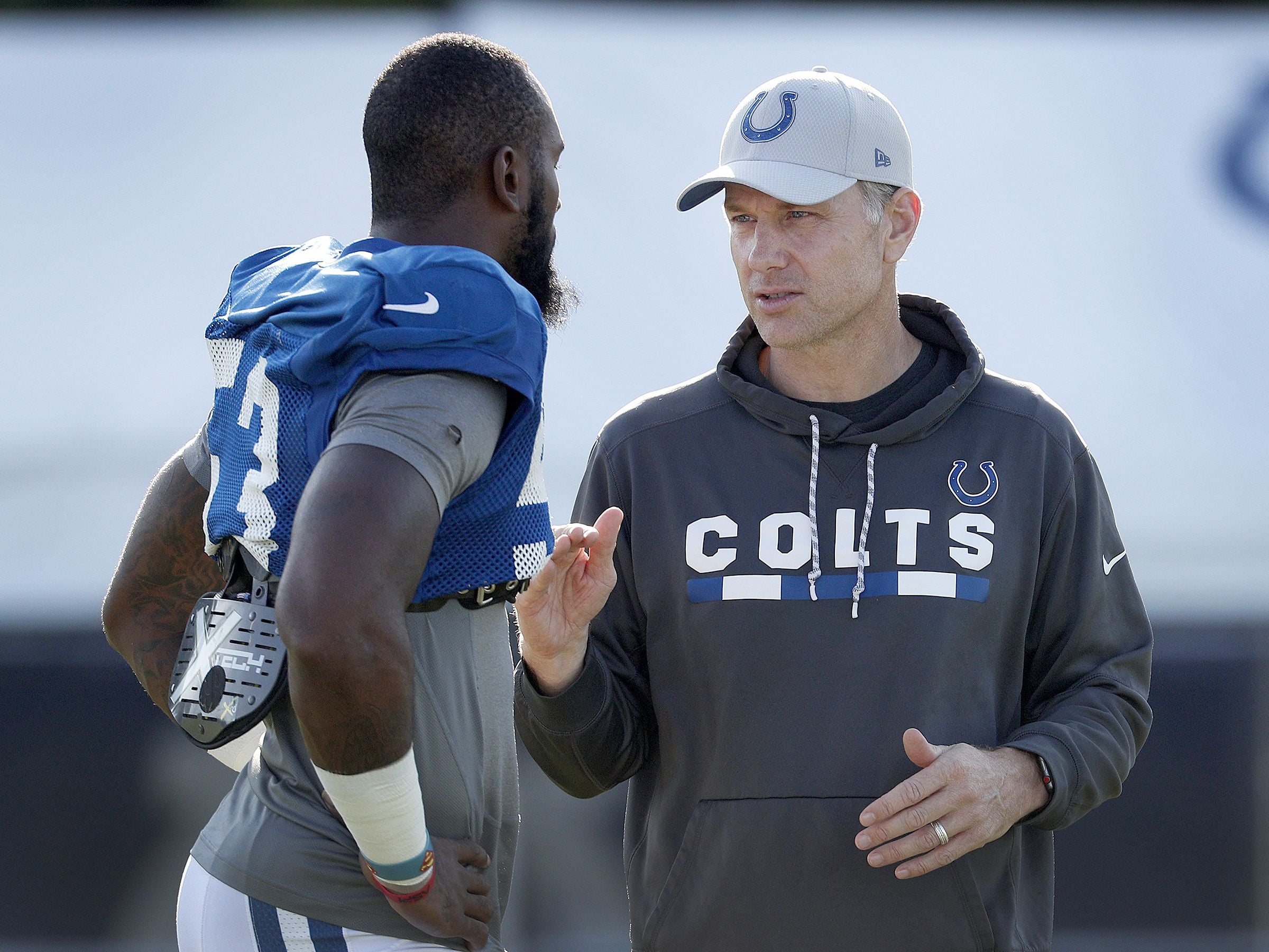 Indianapolis Colts defensive coordinator Matt Eberflus talks with linebacker Shaquille Leonard (53) during the Colts training camp at Grand Park in Westfield on Monday, August 6, 2018. Indianapolis Colts Training Camp At Grand Park In Westfield