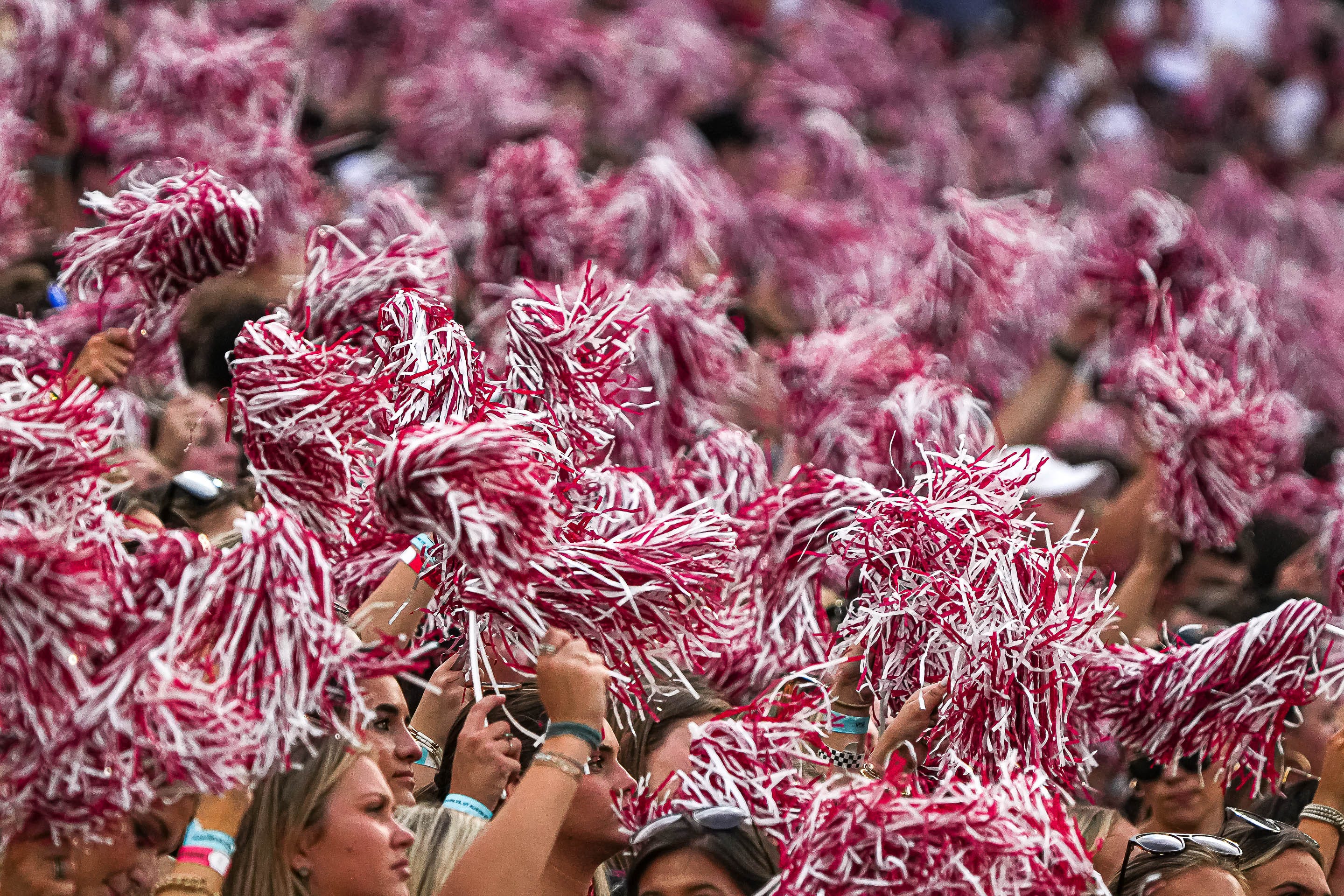 Alabama fans wave pom-poms during the game against the Texas Longhorns at Bryant-Denny Stadium on Saturday, Sep. 9, 2023 in Tuscaloosa, Alabama.