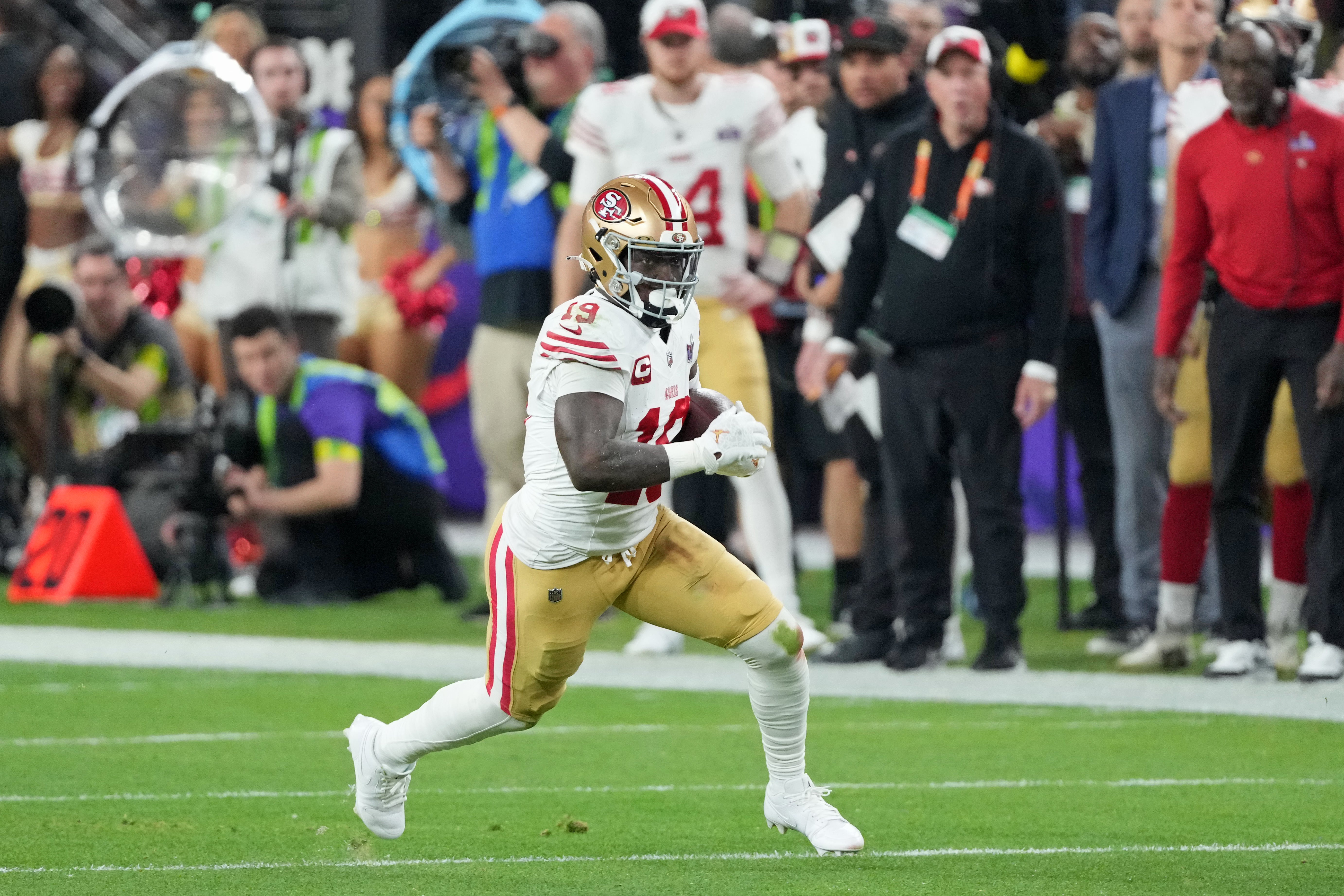 Feb 11, 2024; Paradise, Nevada, USA; San Francisco 49ers wide receiver Deebo Samuel (19) runs with the ball against the Kansas City Chiefs during the third quarter of Super Bowl LVIII at Allegiant Stadium.