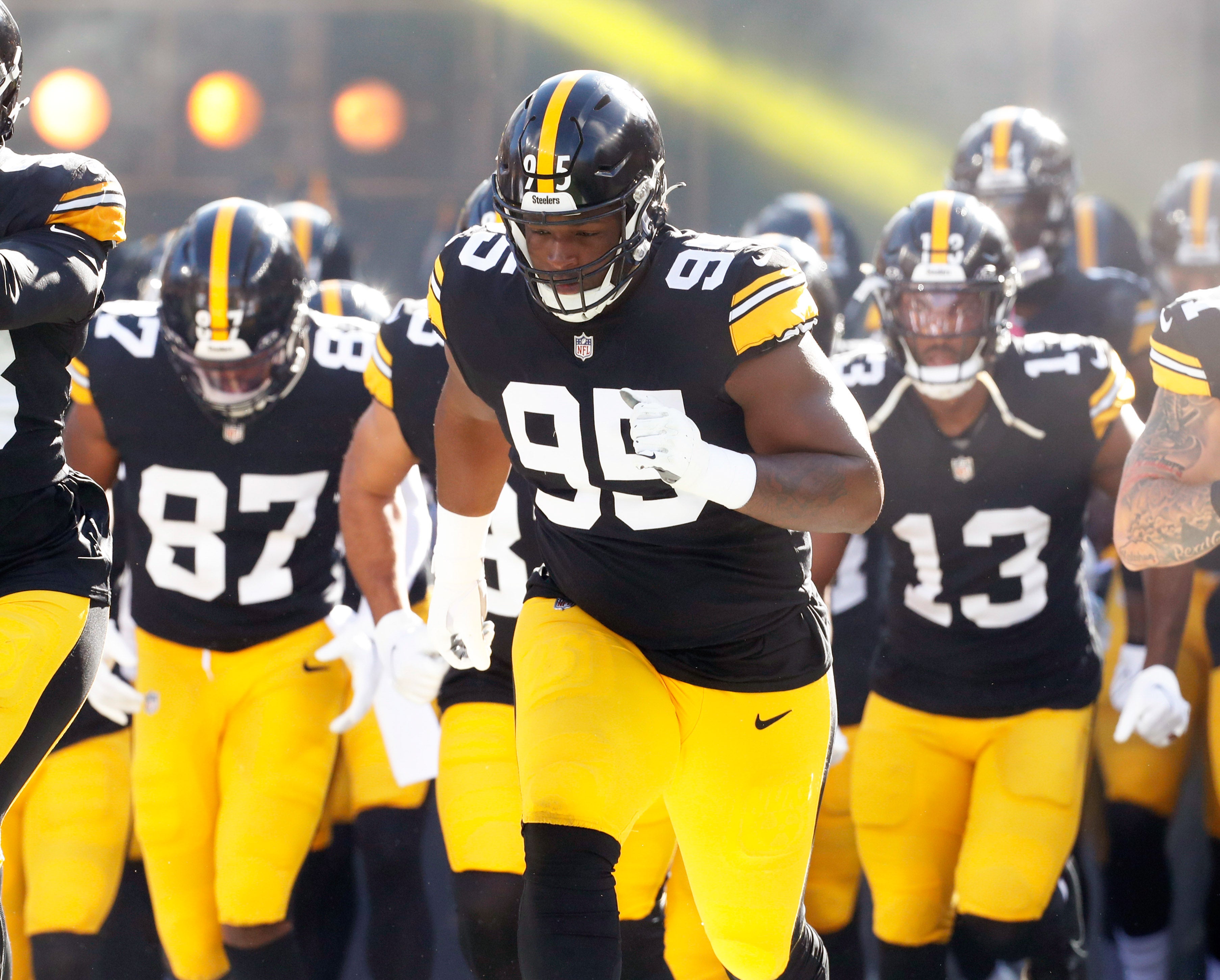 Nov 12, 2023; Pittsburgh, Pennsylvania, USA; Pittsburgh Steelers defensive tackle Keeanu Benton (95) takes the field with teammates against the Green Bay Packers at Acrisure Stadium. Mandatory Credit: Charles LeClaire-USA TODAY Sports
