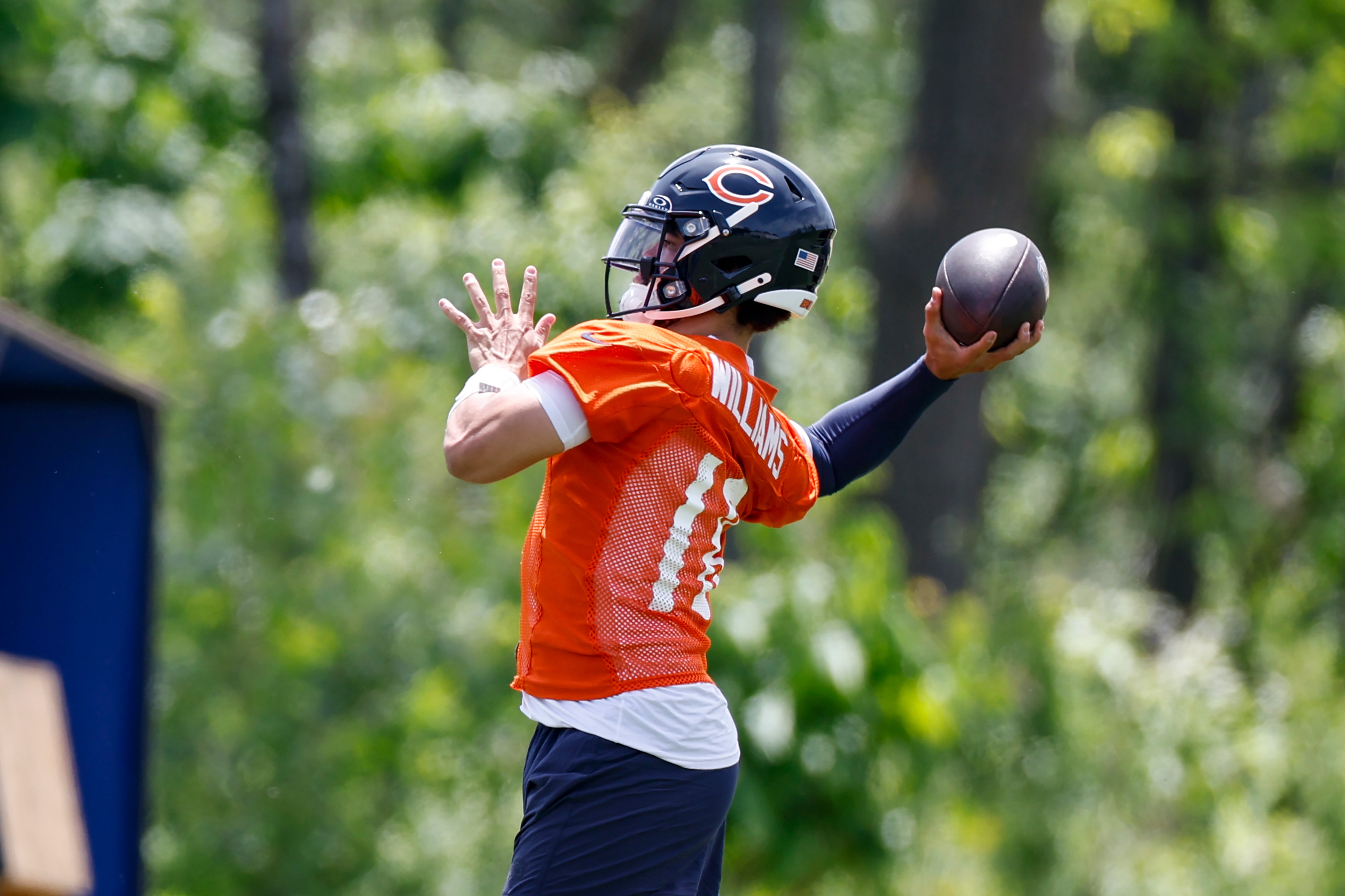 May 31, 2024; Lake Forest, IL, USA; Chicago Bears quarterback Caleb Williams (18) throws the ball during organized team activities at Halas Hall.
