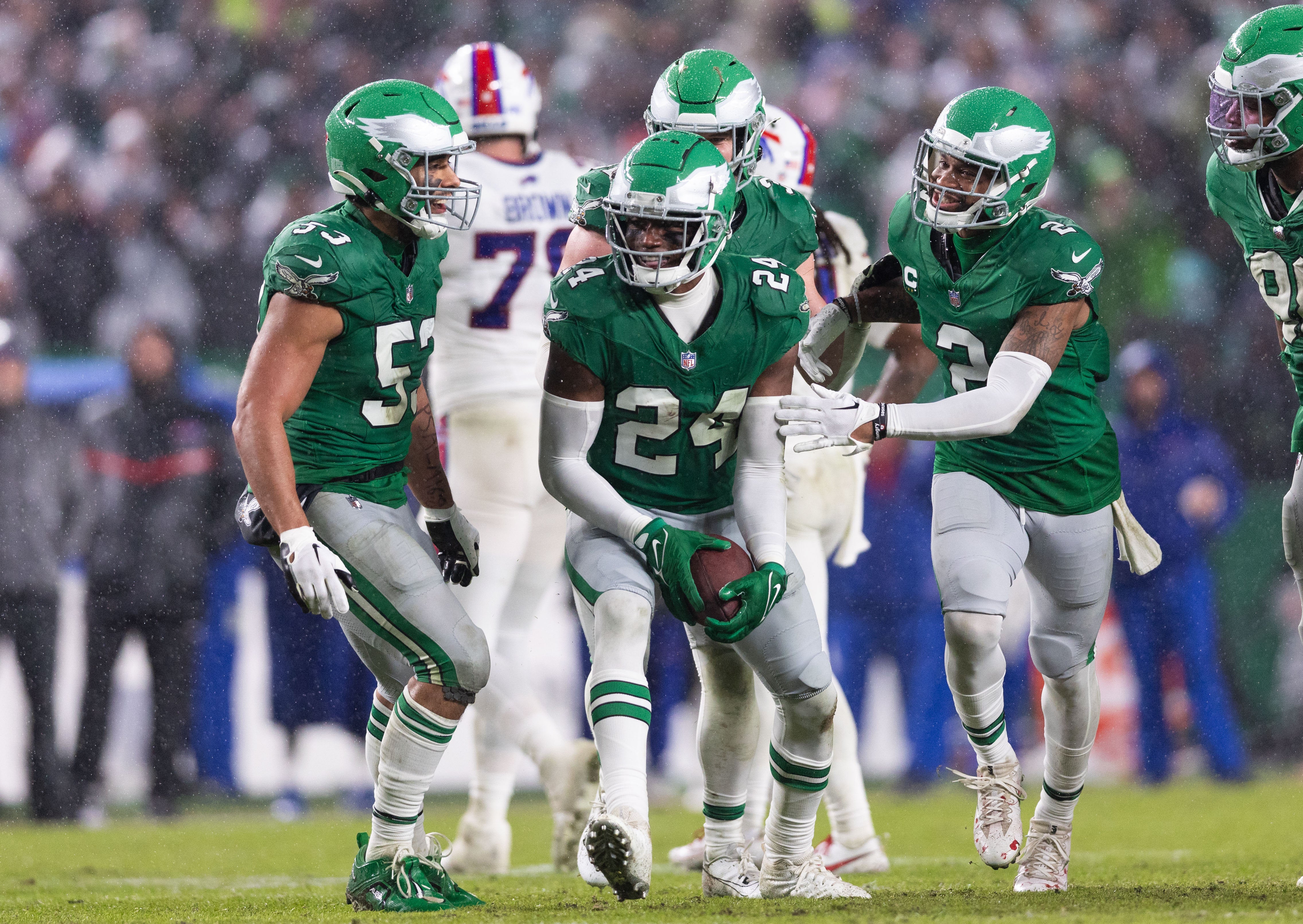 Nov 26, 2023; Philadelphia, Pennsylvania, USA; Philadelphia Eagles cornerback James Bradberry (24) celebrates with cornerback Darius Slay (2) and linebacker Christian Elliss (53) after his interception against the Buffalo Bills during the third quarter at Lincoln Financial Field.