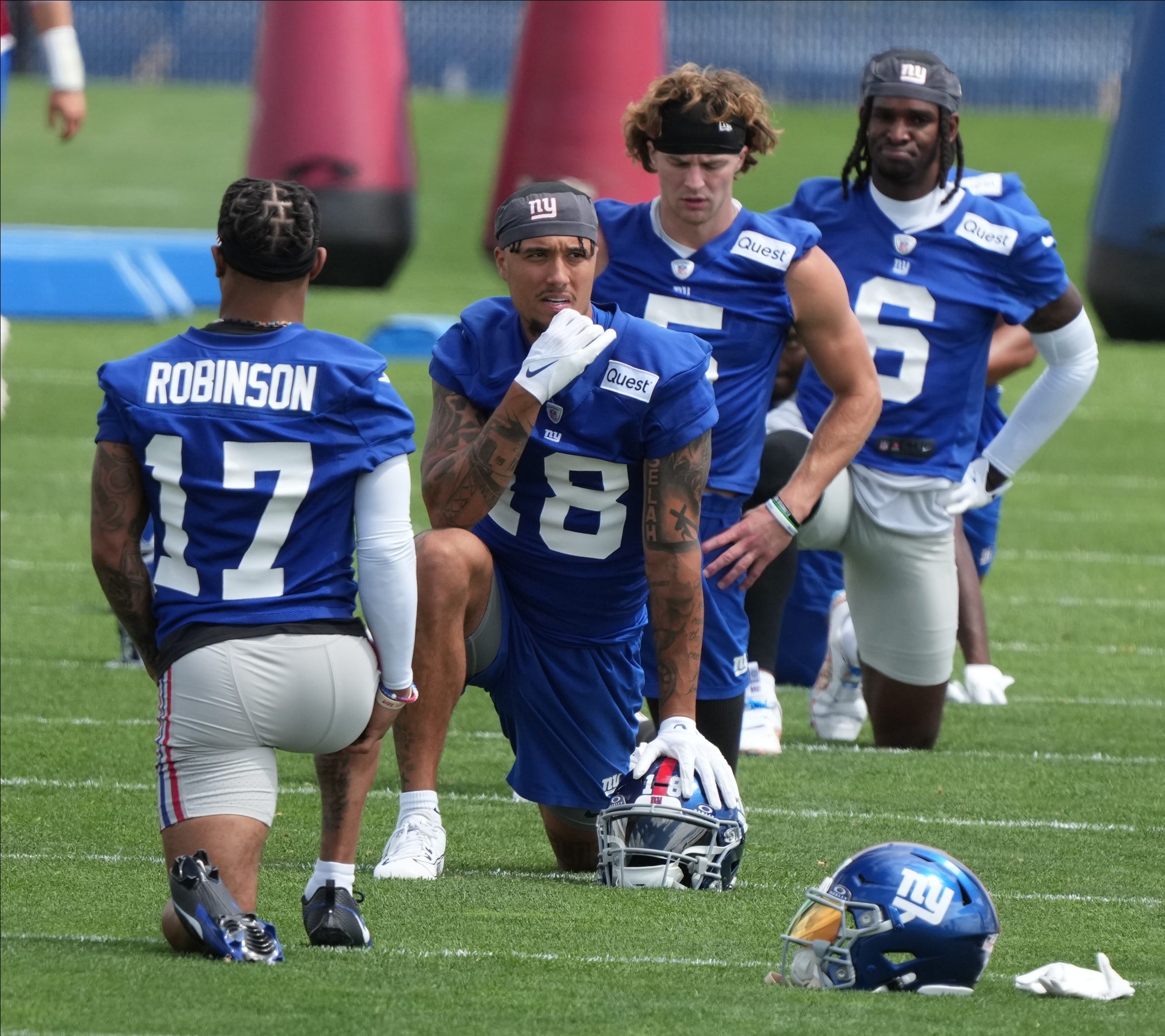 East Rutherford, NJ -- June 11, 2024 -- Wide receivers, Wan'Dale Robinson, Isaiah Hodgins, Chase Coat and Bryce Ford-Wheaton at the NY Giants Mandatory Minicamp at their practice facility in East Rutherford, NJ.