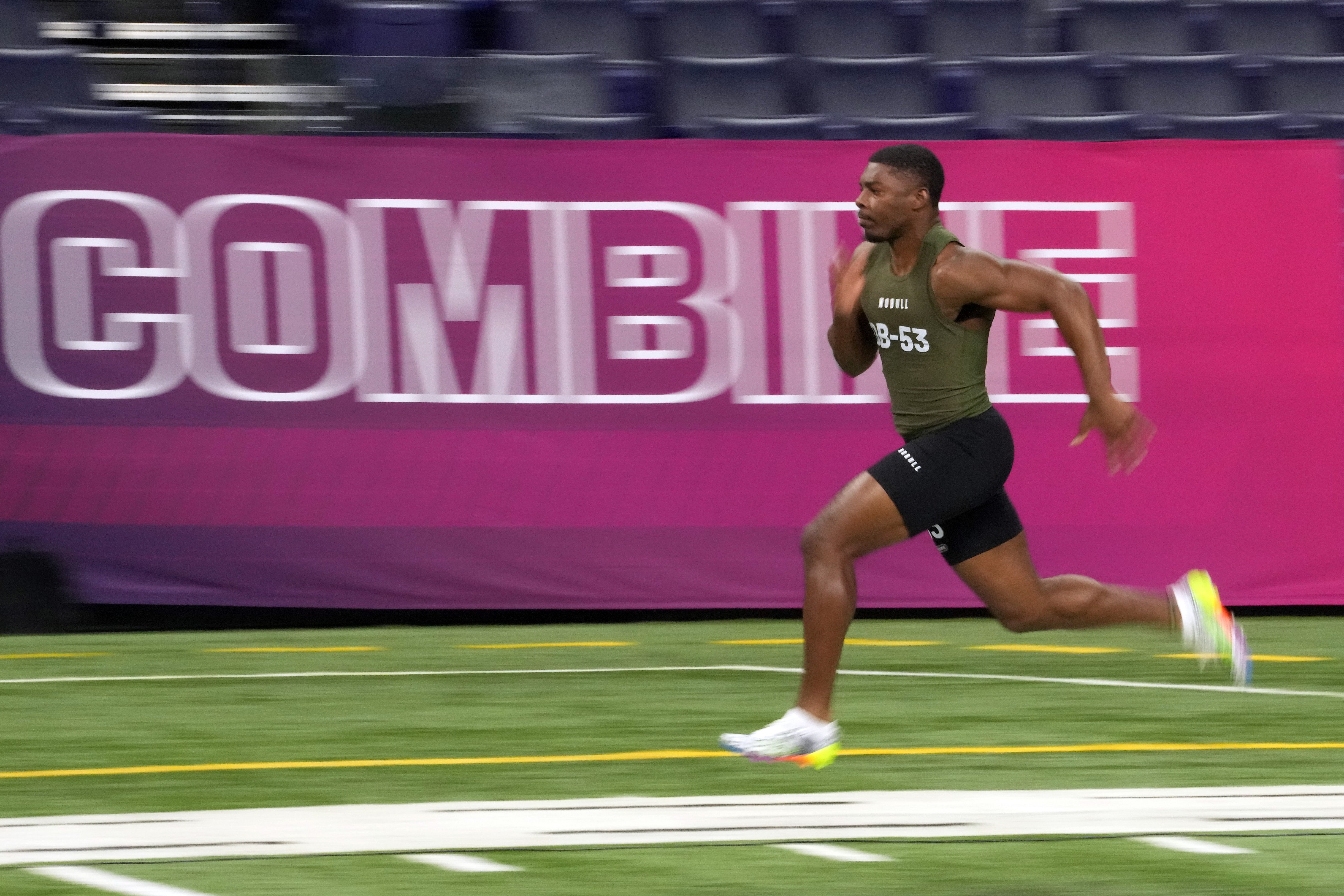 Mar 1, 2024; Indianapolis, IN, USA; Miami-Fl defensive back Kamren Kinchens (DB53) works out during the 2024 NFL Combine at Lucas Oil Stadium. Mandatory Credit: Kirby Lee-USA TODAY Sports