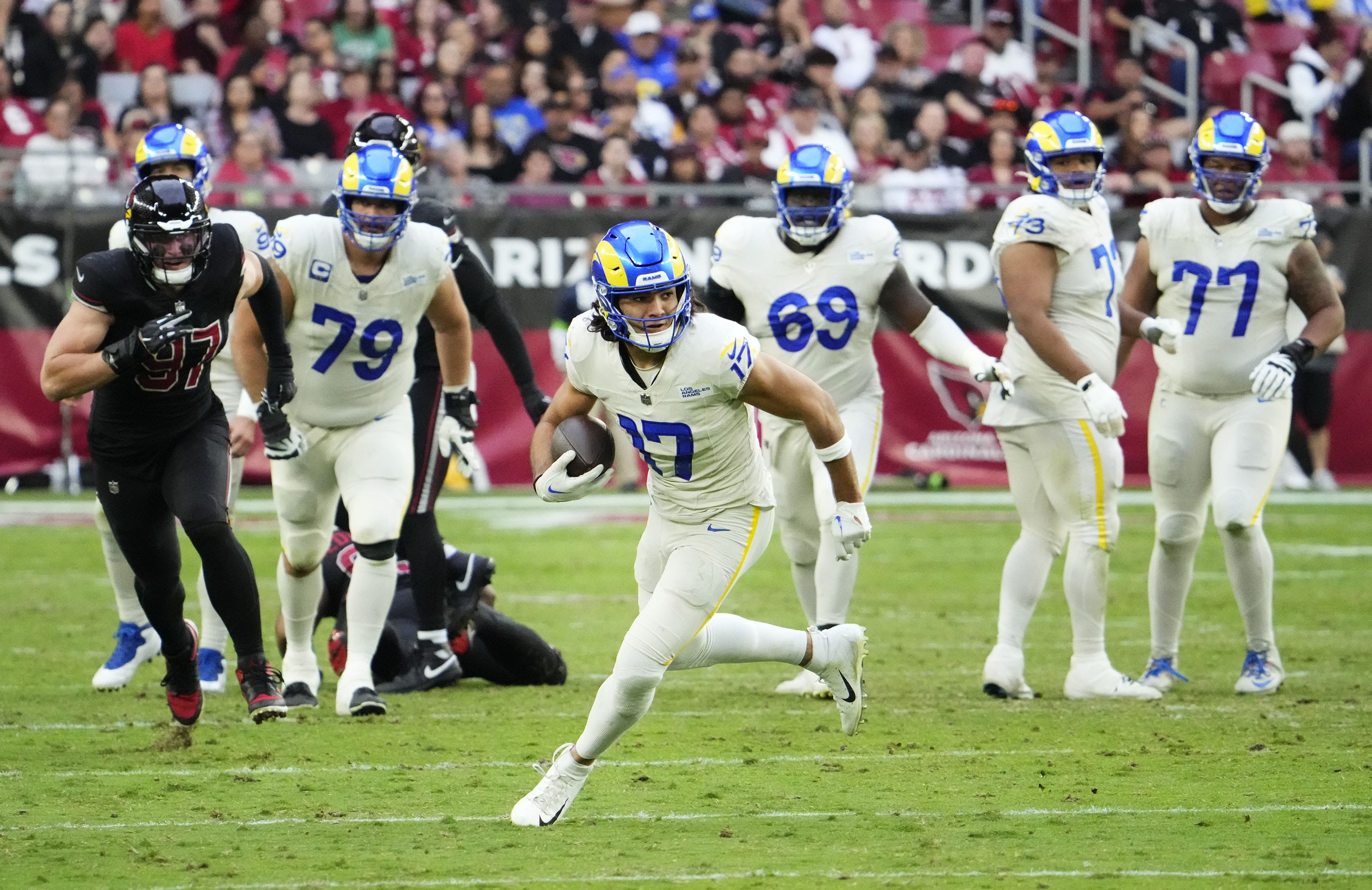 Los Angeles Rams wide receiver Puka Nacua (17) breaks down field against the Arizona Cardinals in the second half at State Farm Stadium in Glendale on Nov. 26, 2023.
