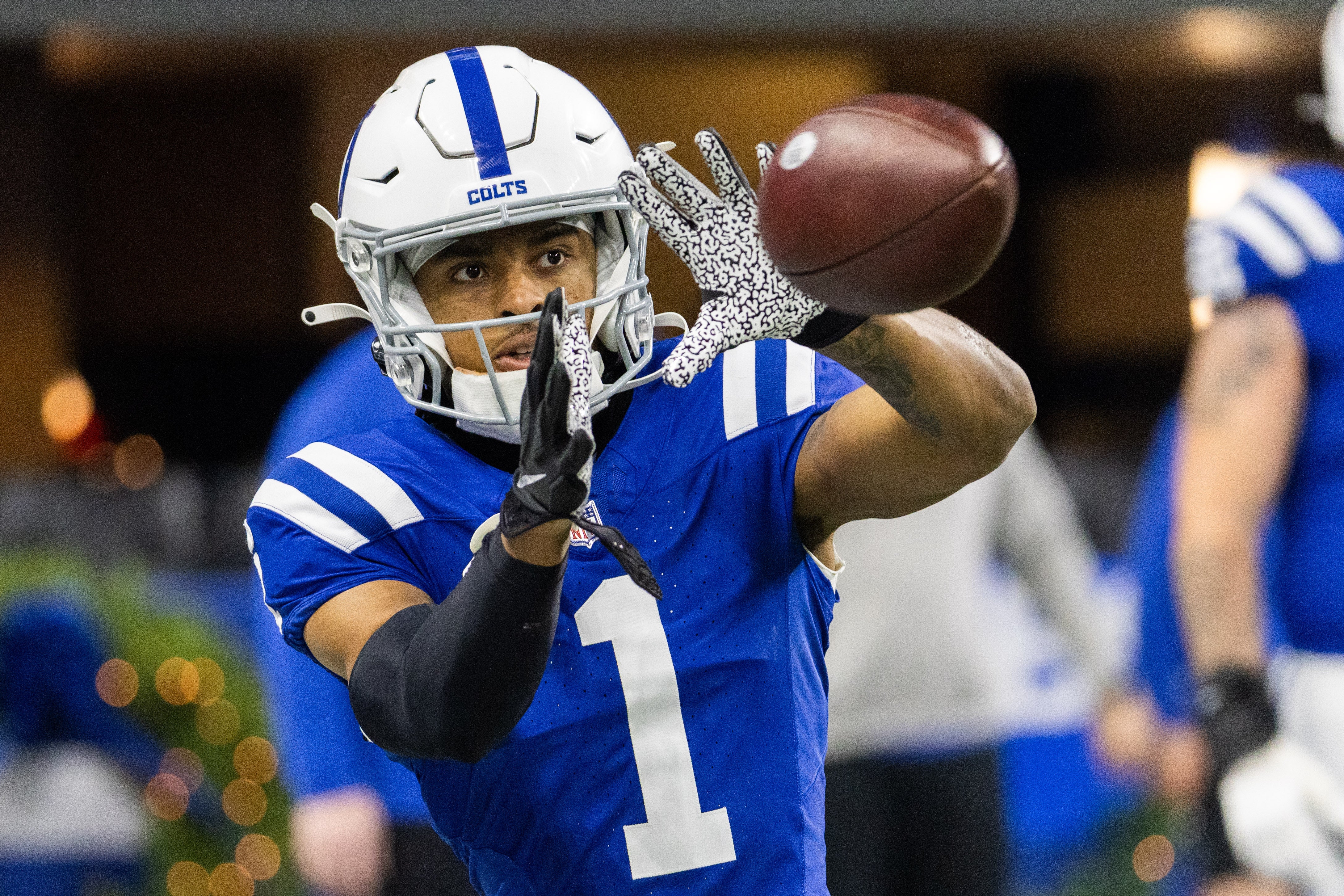 Dec 31, 2023; Indianapolis, Indiana, USA; Indianapolis Colts wide receiver Josh Downs (1) catches a ball during warmups before the game against the Las Vegas Raiders at Lucas Oil Stadium.
