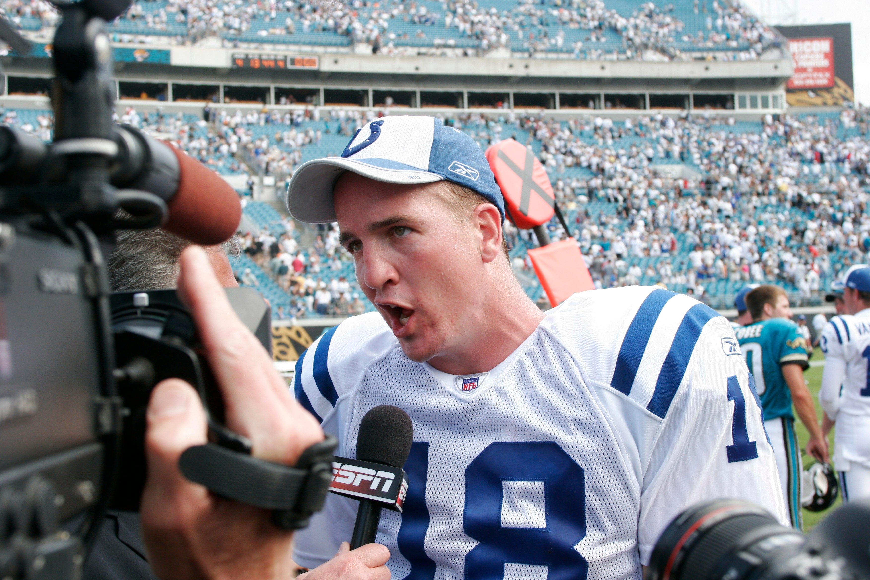 Oct 3, 2004; Jacksonville, FL, USA; Indianapolis Colts quarterback Peyton Manning speaks to reporters after beating the Jacksonville Jaguars at Alltel Stadium. The Colts beat the Jaguars 24-17.