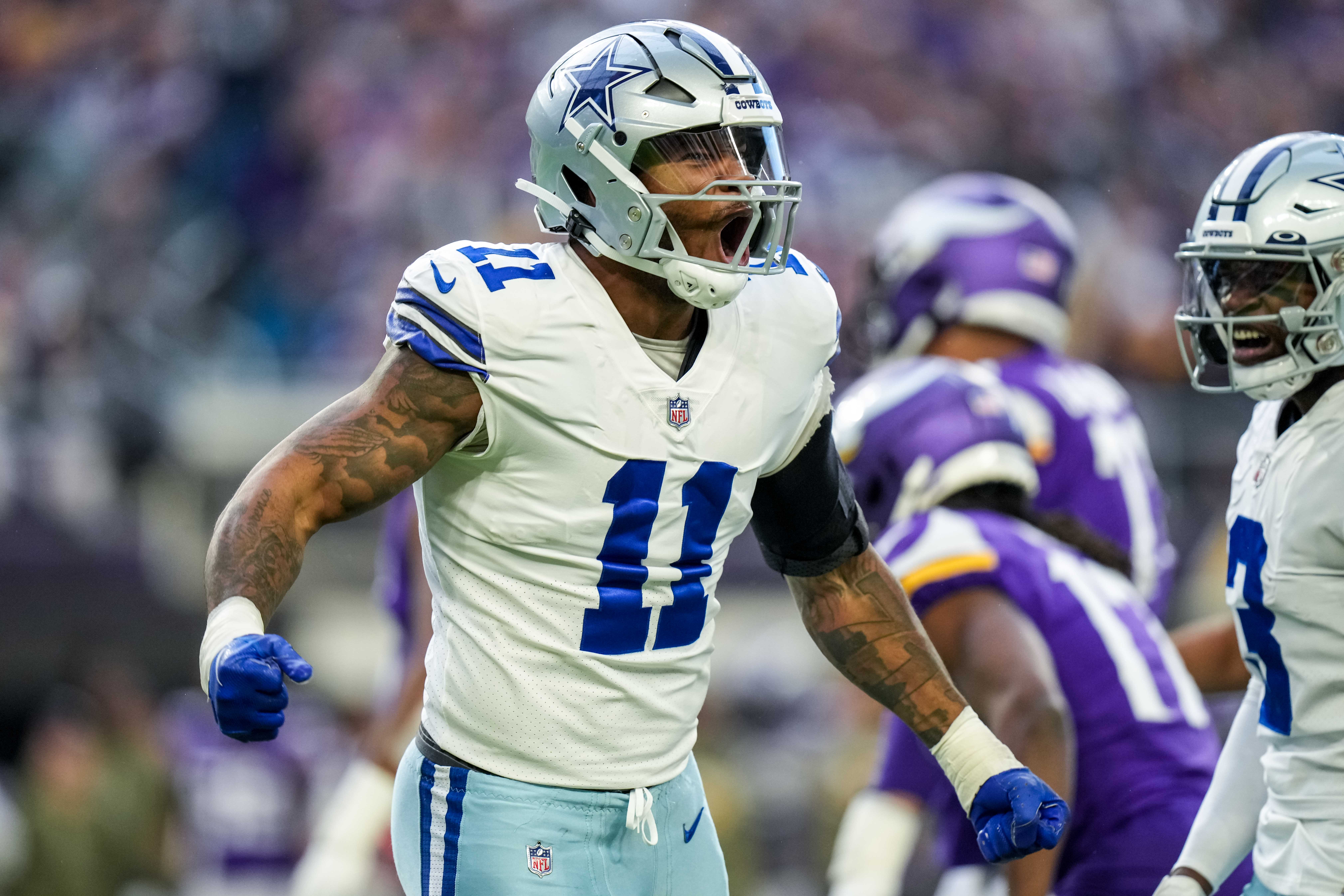 Dallas Cowboys linebacker Micah Parsons (11) celebrates during the first quarter against the Minnesota Vikings at U.S. Bank Stadium.