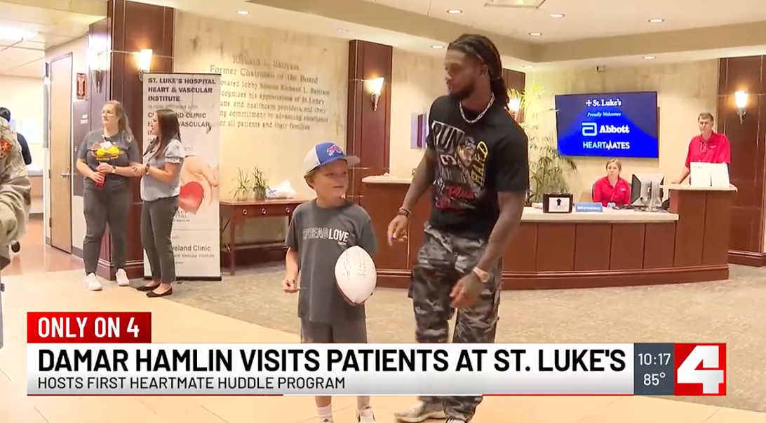 Damar Hamlin visits with patients at a St. Louis hospital.