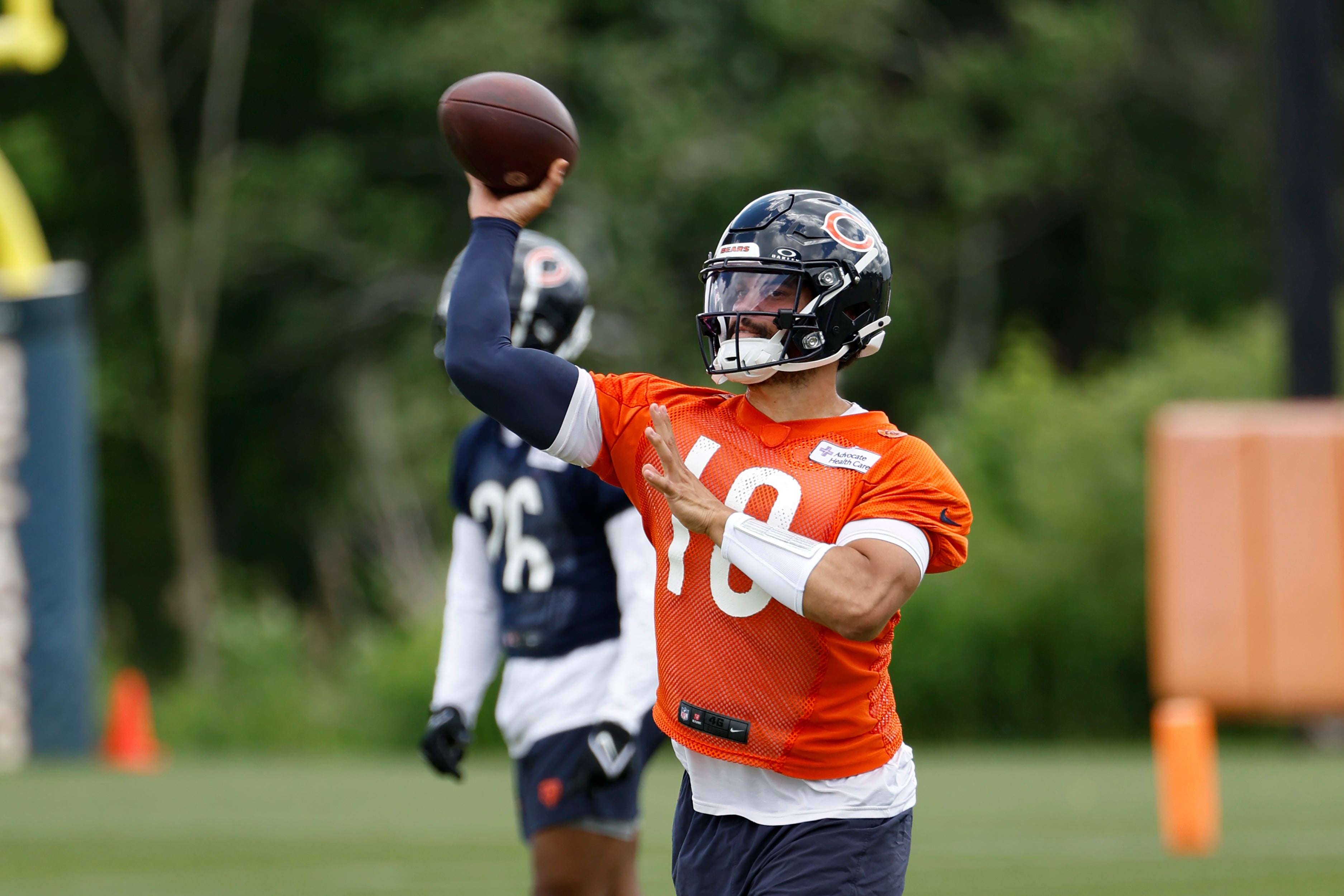 Jun 5, 2024; Lake Forest, IL, USA; Chicago Bears quarterback Caleb Williams (18) passes the ball during the team's minicamp at Halas Hall.
